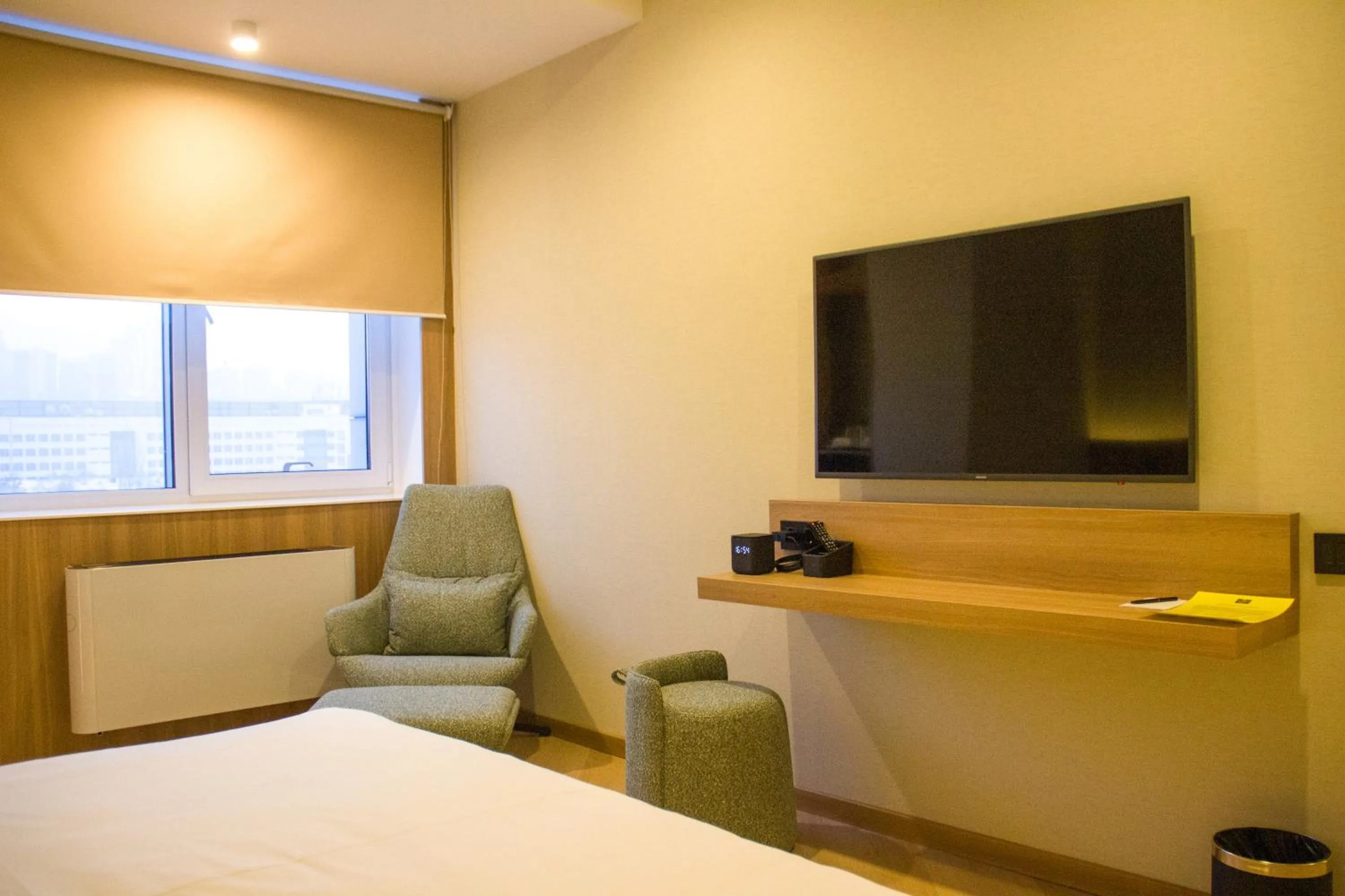 Communal lounge/ TV room, Bed in Resident Hotel Abay