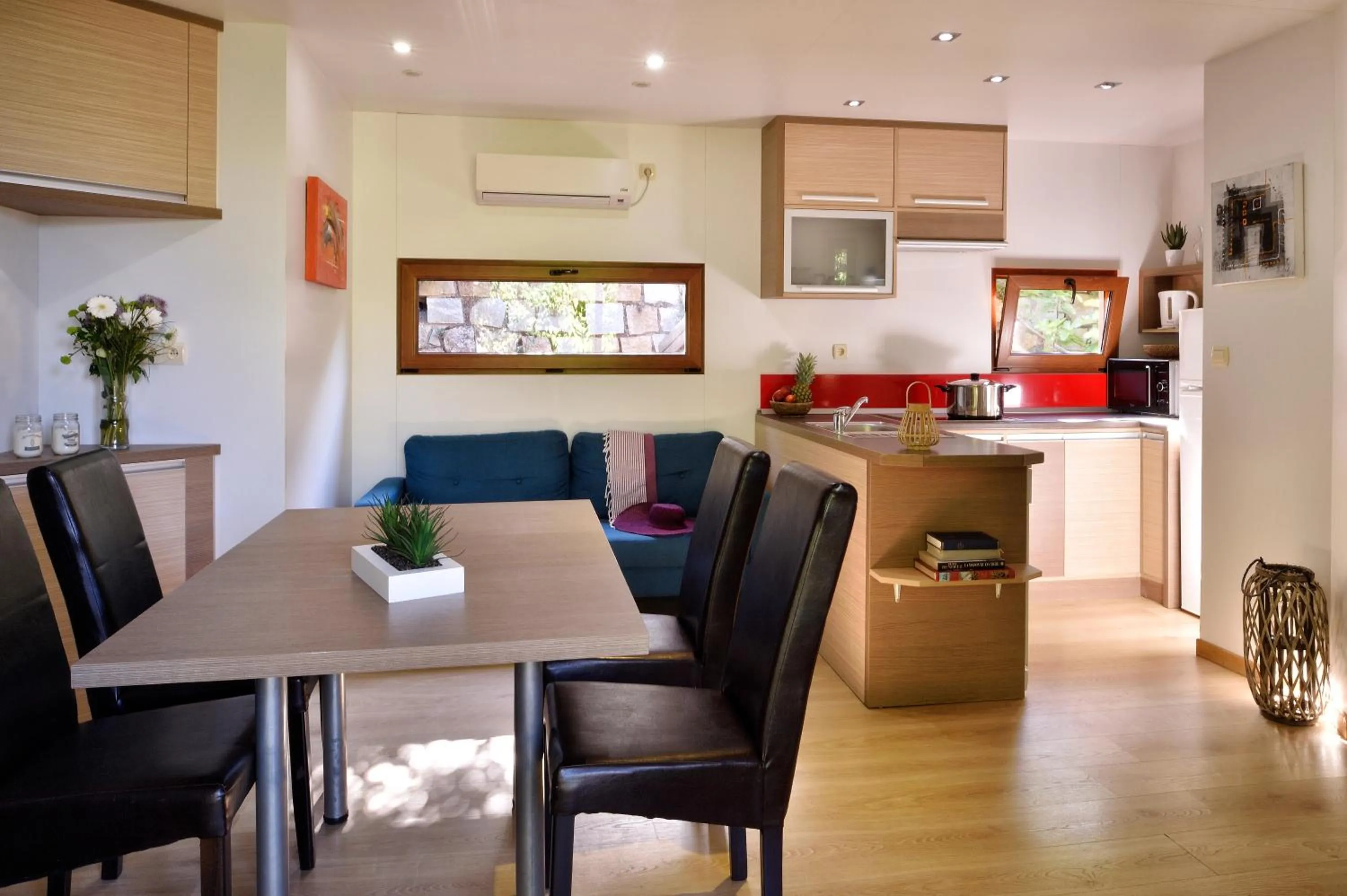 Kitchen or kitchenette in Résidence & Hotel U Livanti ECOLABEL