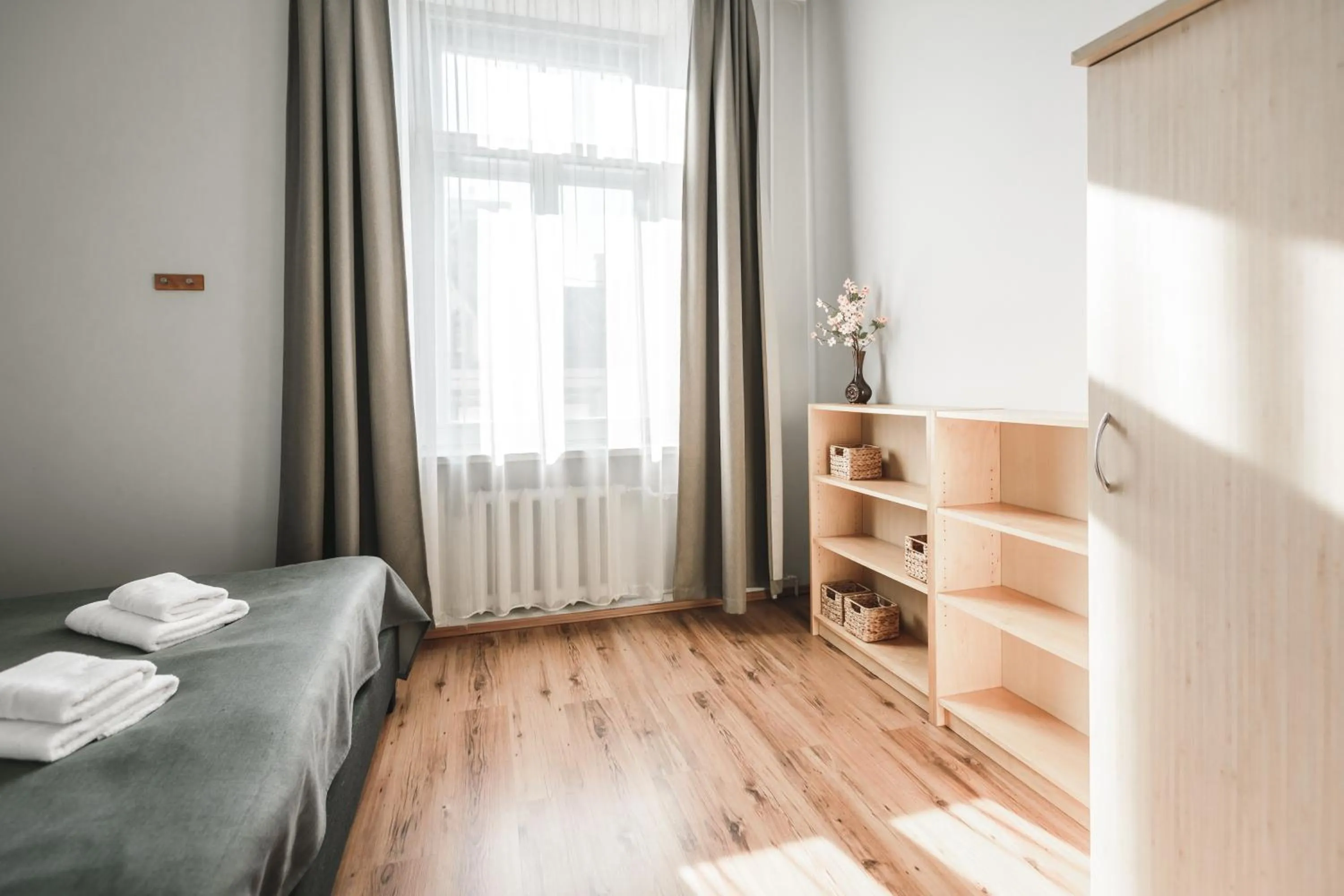 Bed in Bearsleys Downtown Apartments