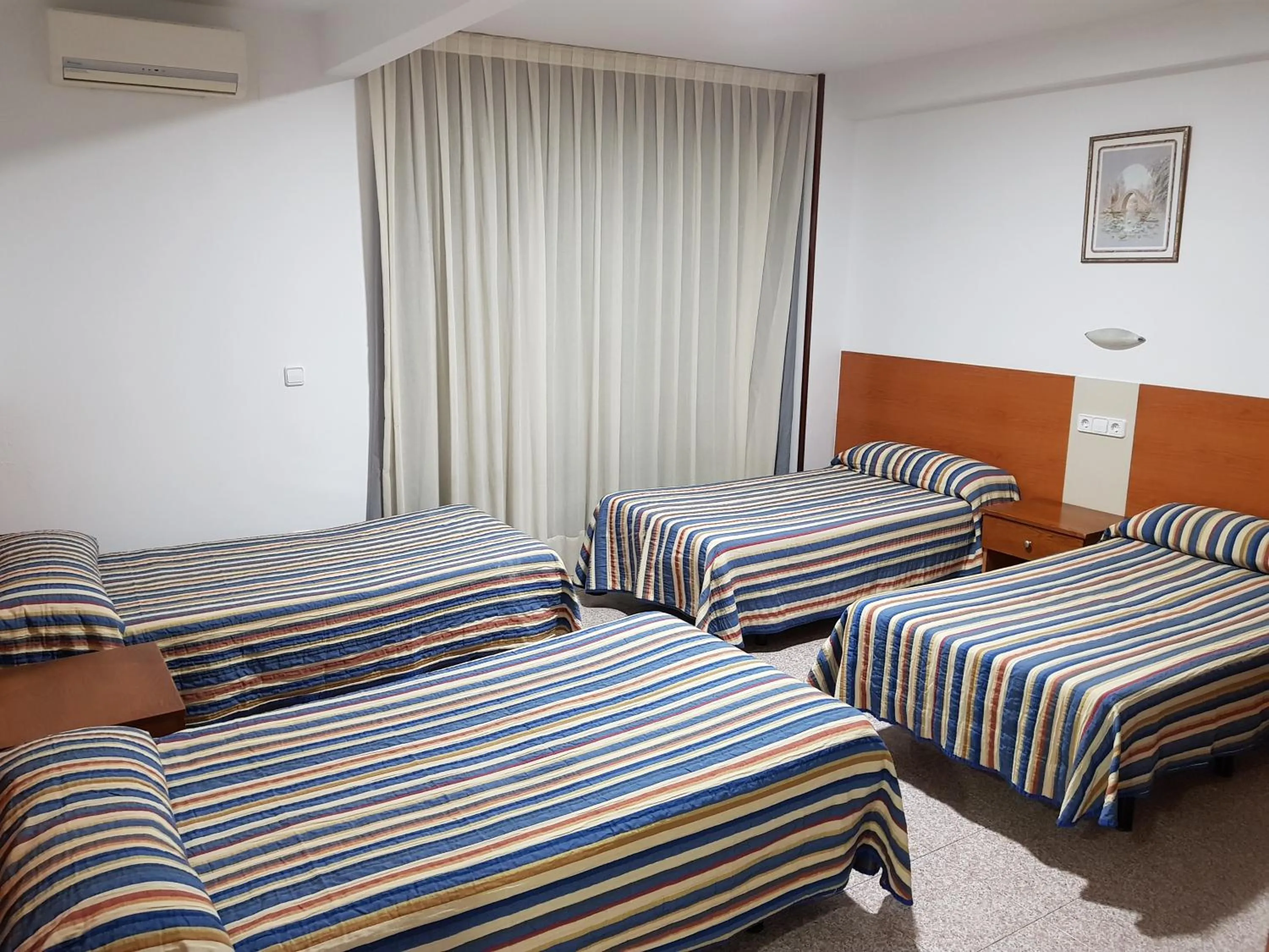 Bed in Pensión La Orozca Benidorm