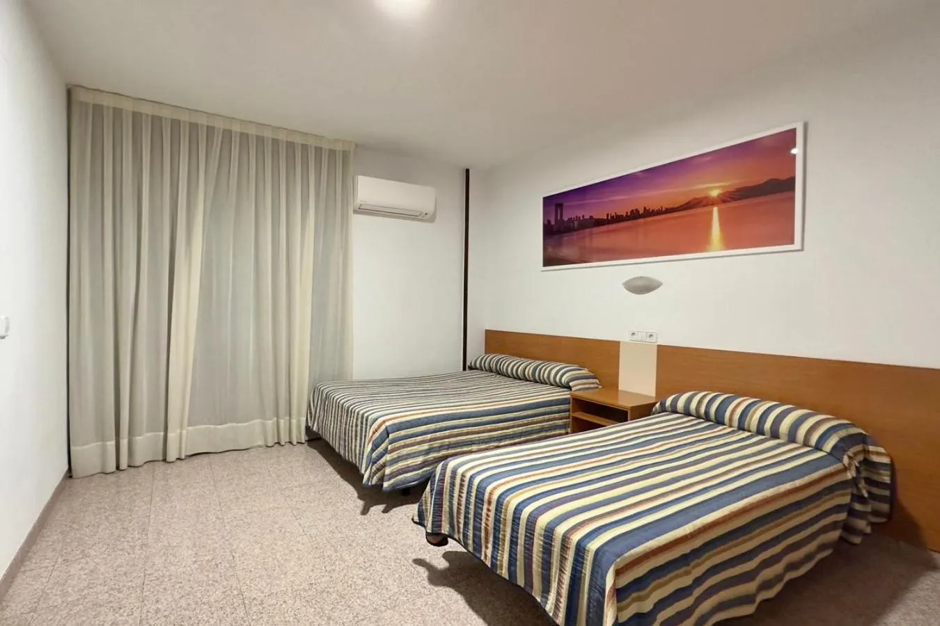 Bed in Pensión La Orozca Benidorm