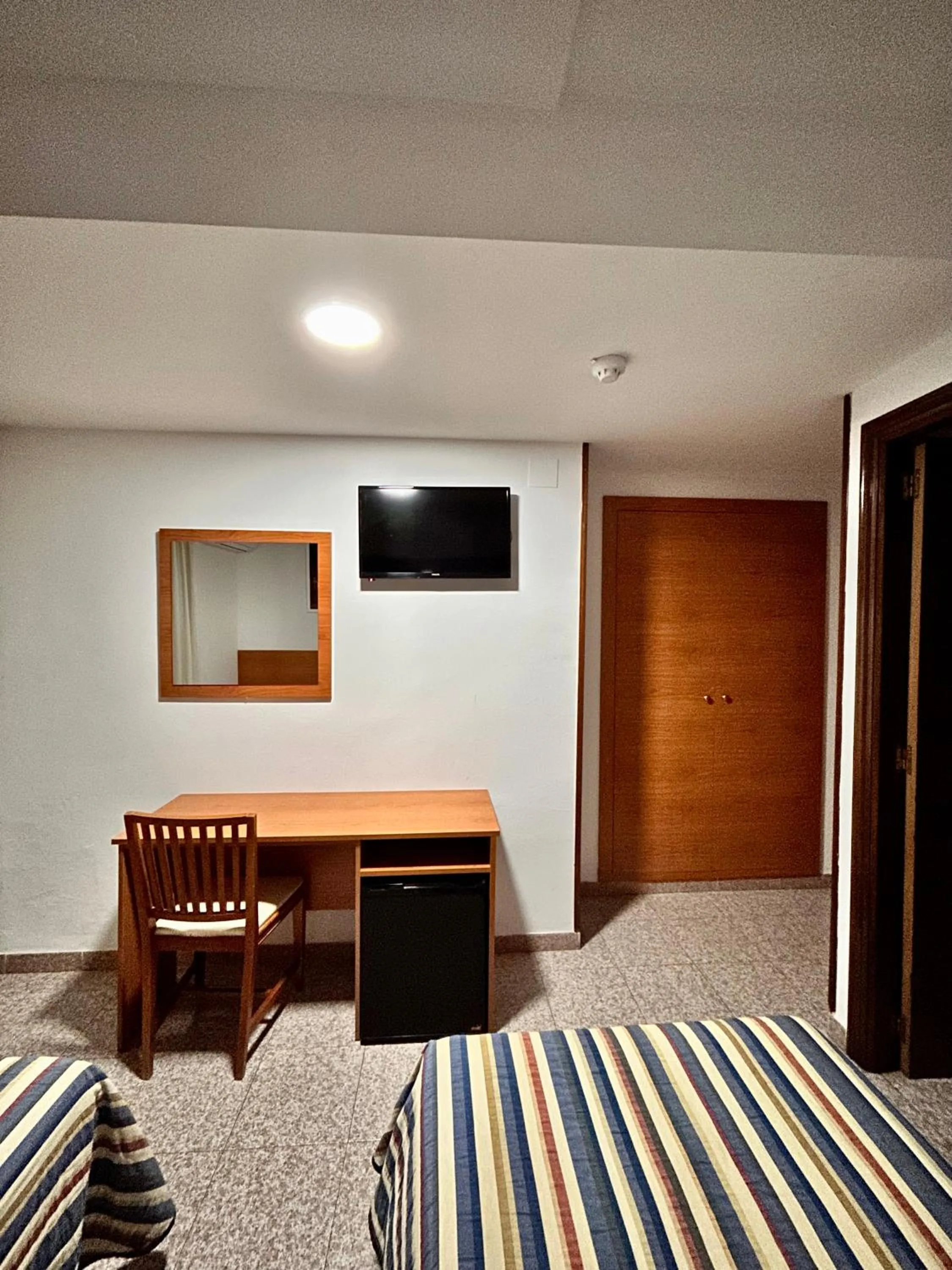 Bed in Pensión La Orozca Benidorm