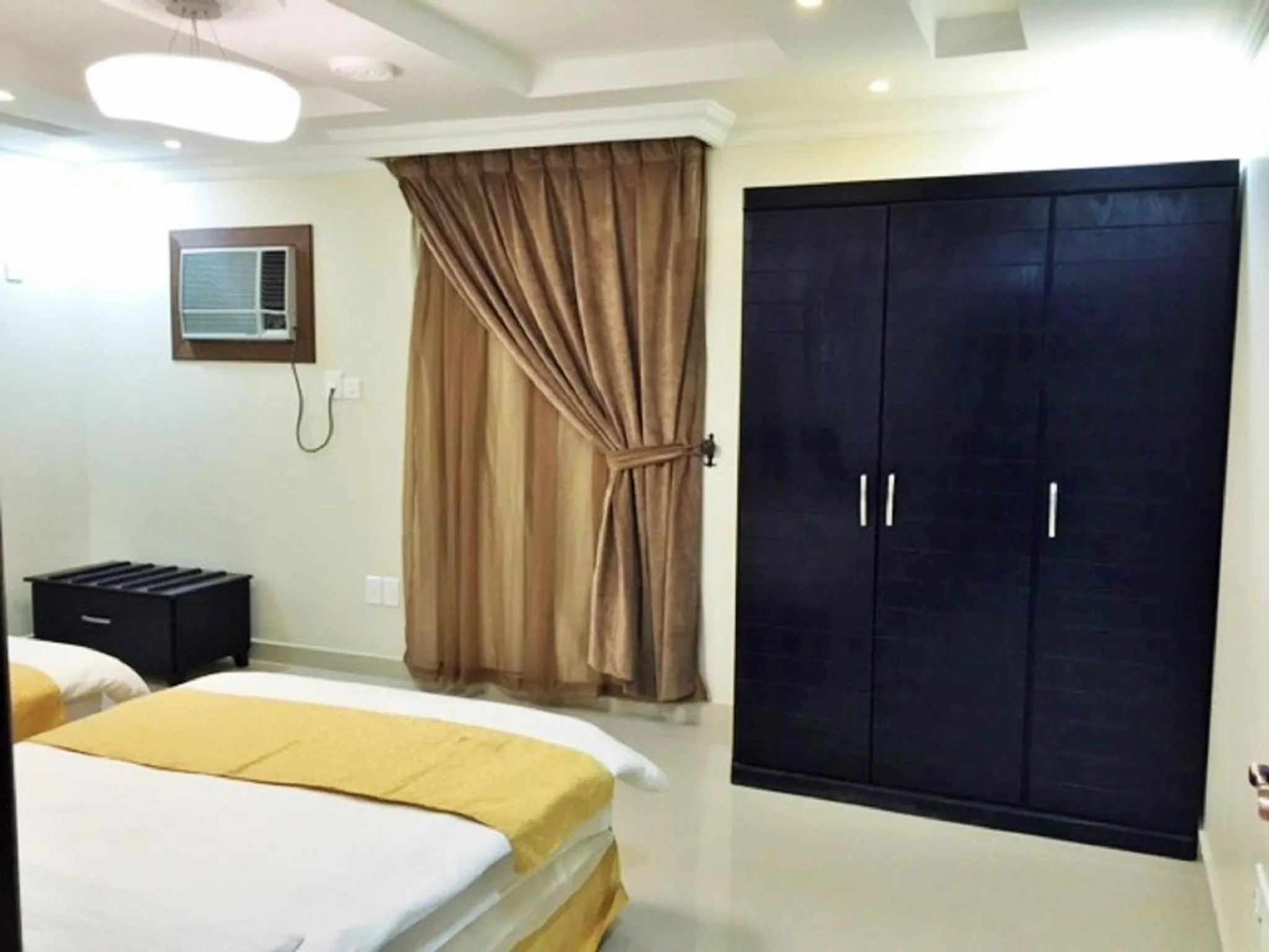 Photo of the whole room, Bed in Hona Al Holm Furnished Units