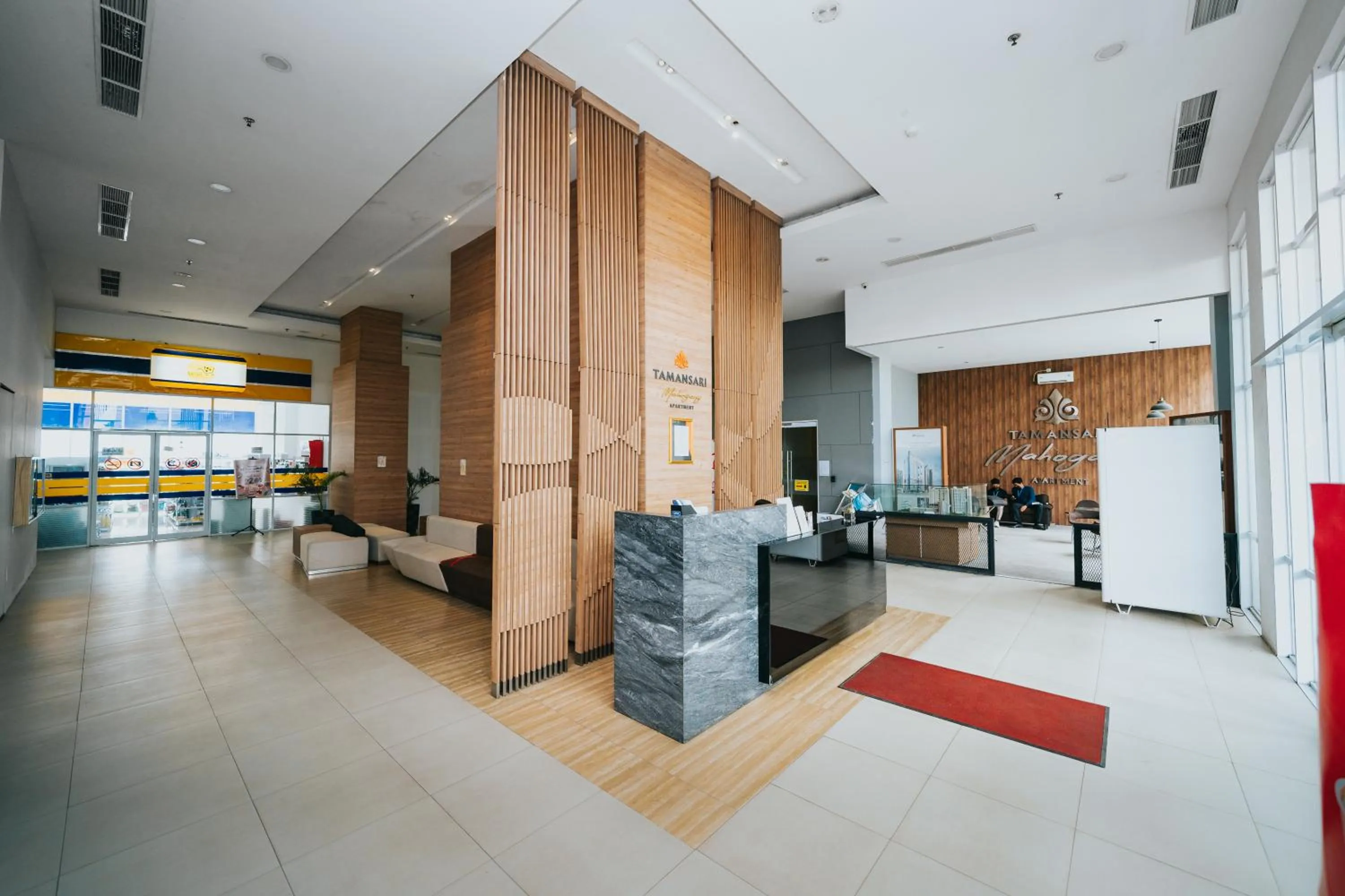 Lobby or reception in Tmansari Mahogany Apartement By Cozy