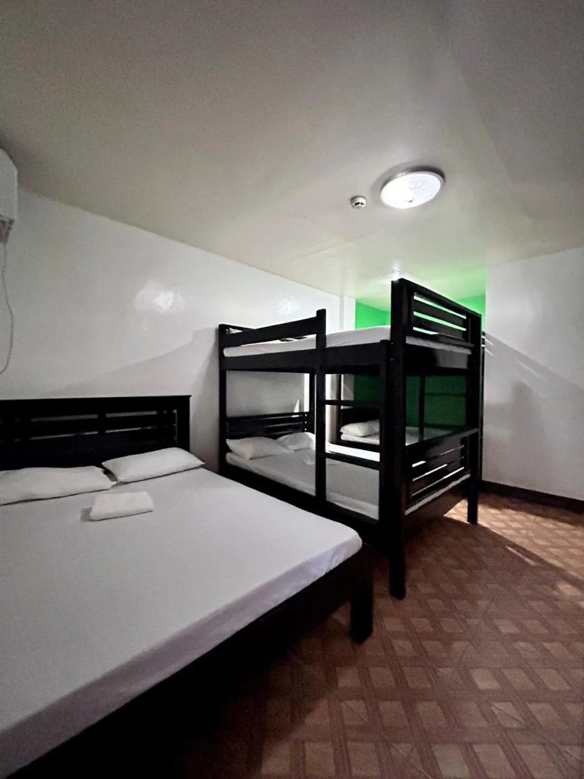 Bed in KNB West Villa Inn by SMS Hospitality