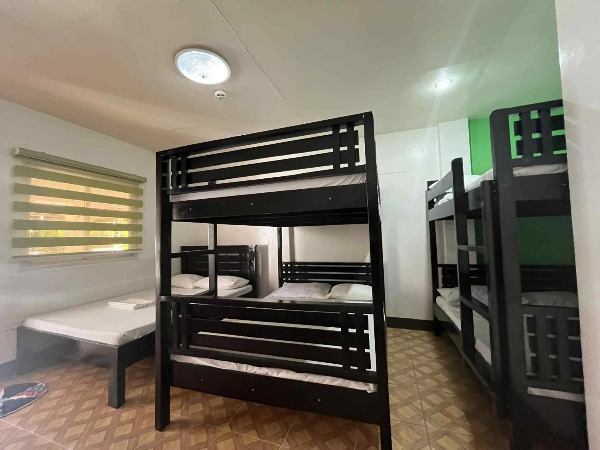 Bed in KNB West Villa Inn by SMS Hospitality