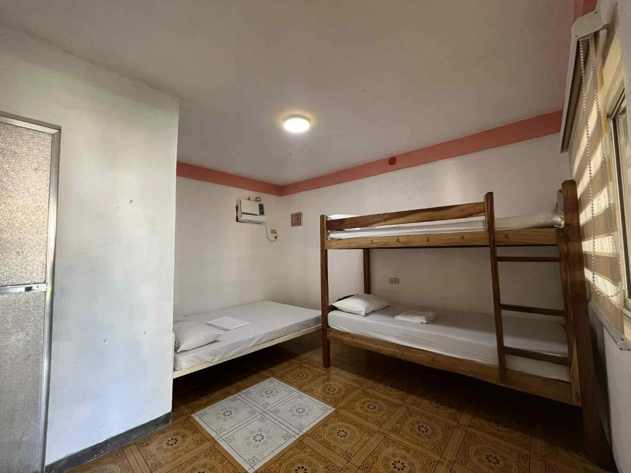 Bed in KNB West Villa Inn by SMS Hospitality