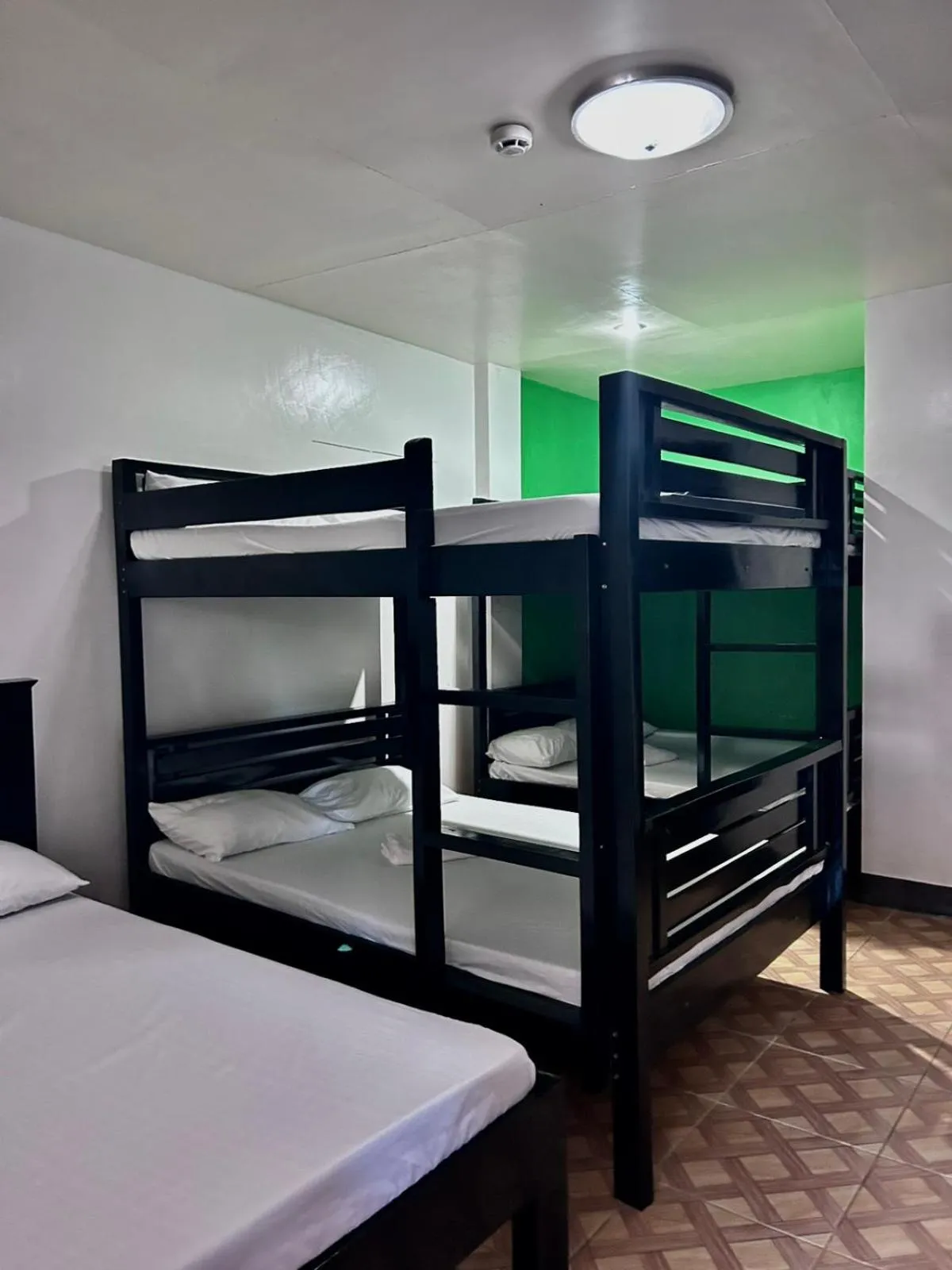 Bed in KNB West Villa Inn by SMS Hospitality