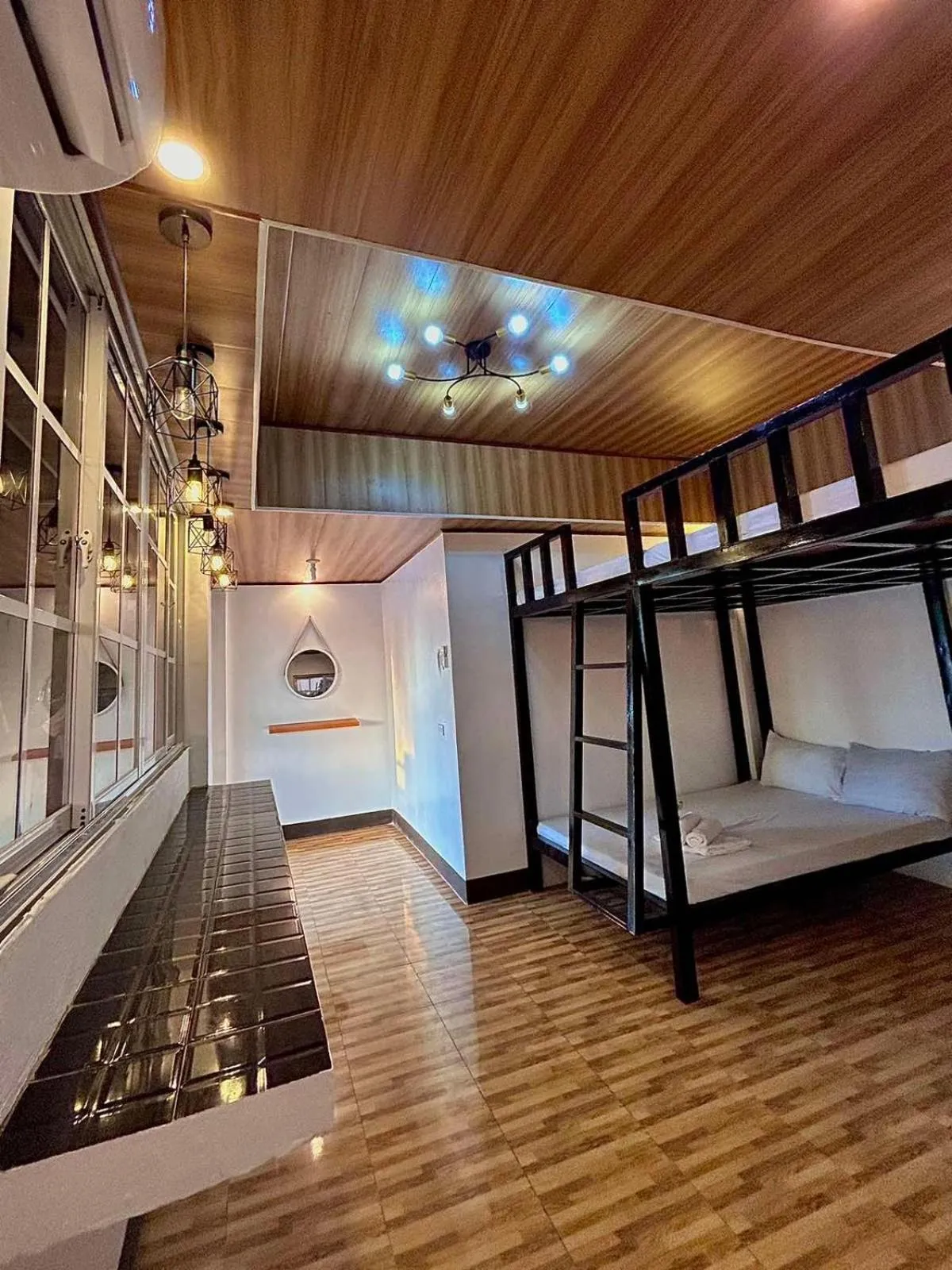 Bed in KNB West Villa Inn by SMS Hospitality