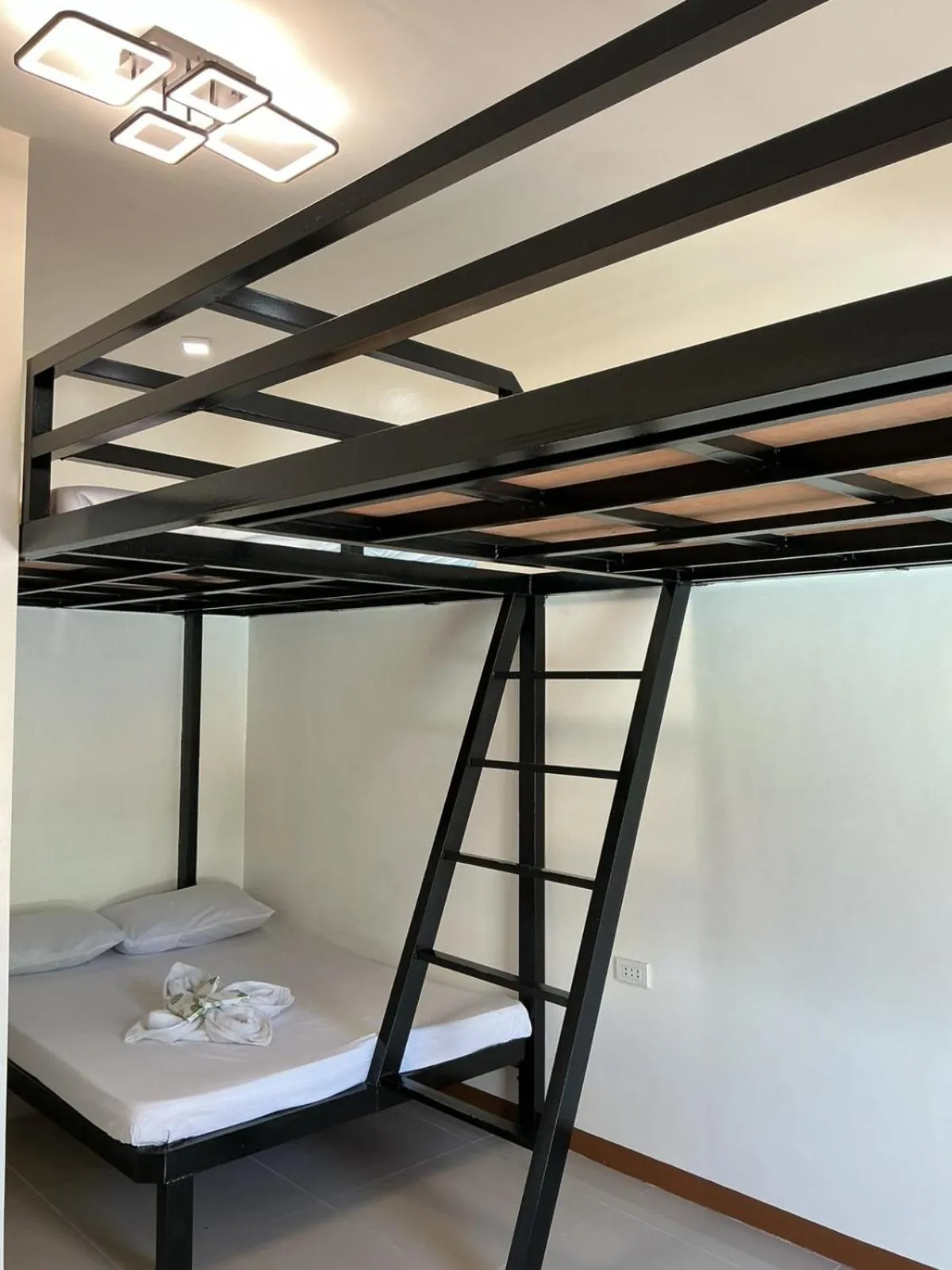 Bed in KNB West Villa Inn by SMS Hospitality