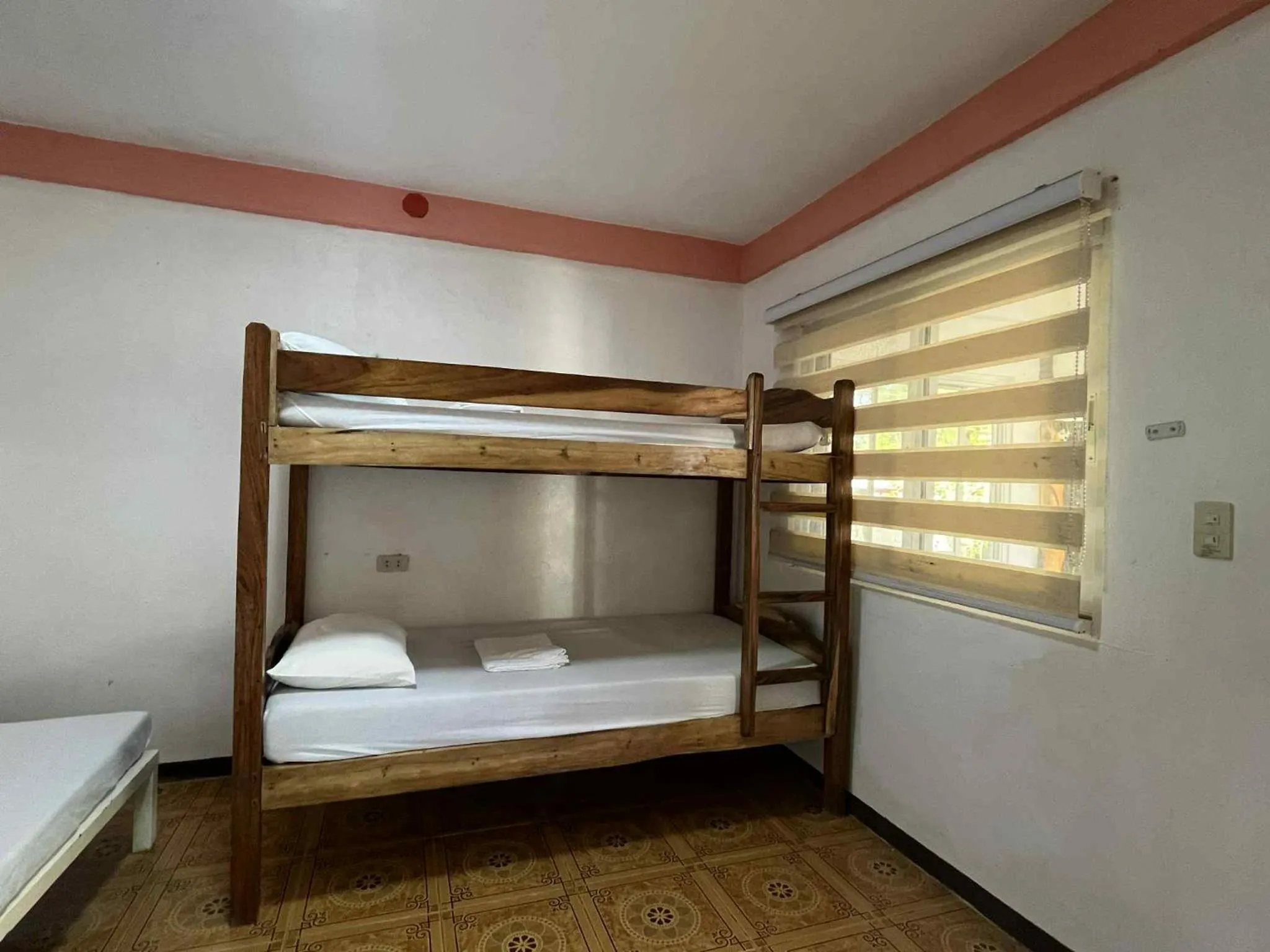 Bed in KNB West Villa Inn by SMS Hospitality