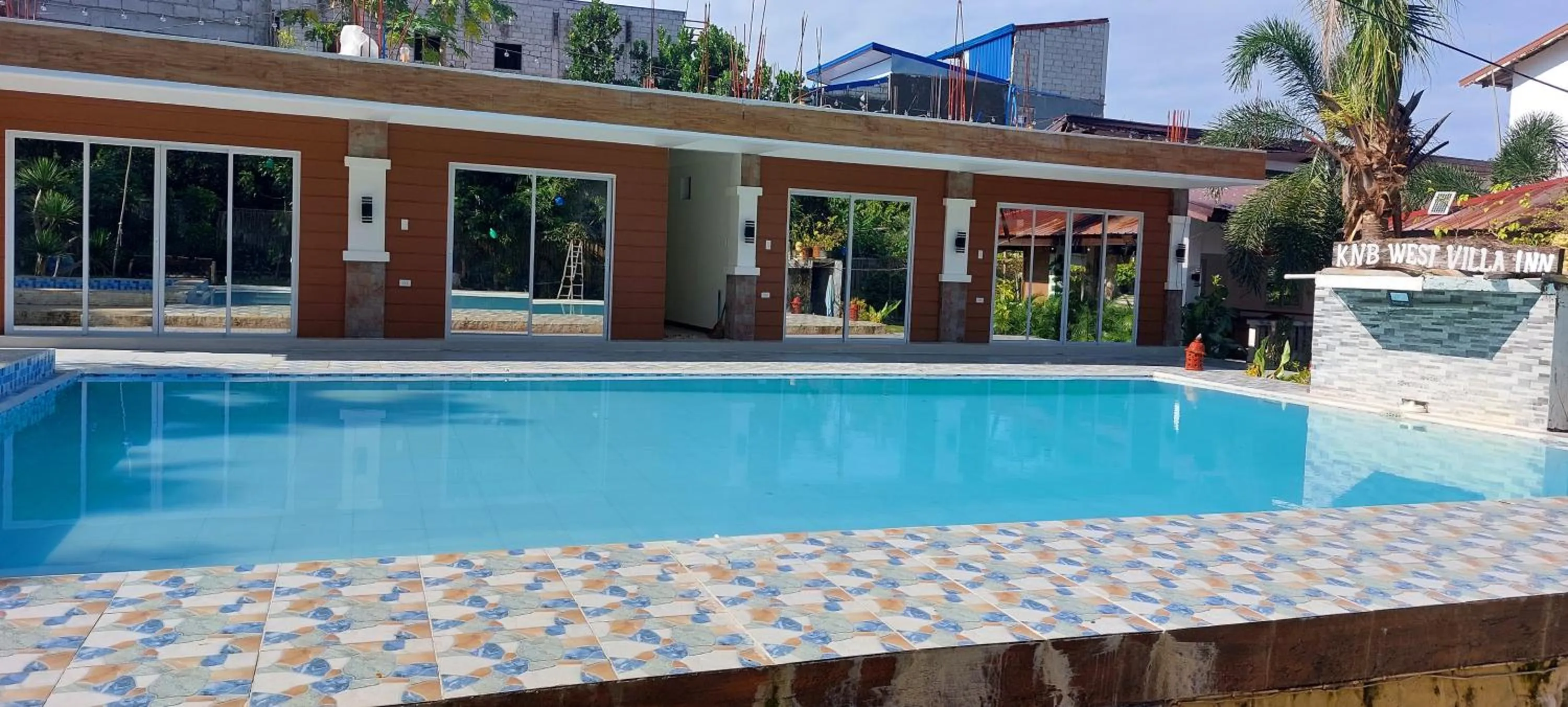 Swimming pool in KNB West Villa Inn by SMS Hospitality
