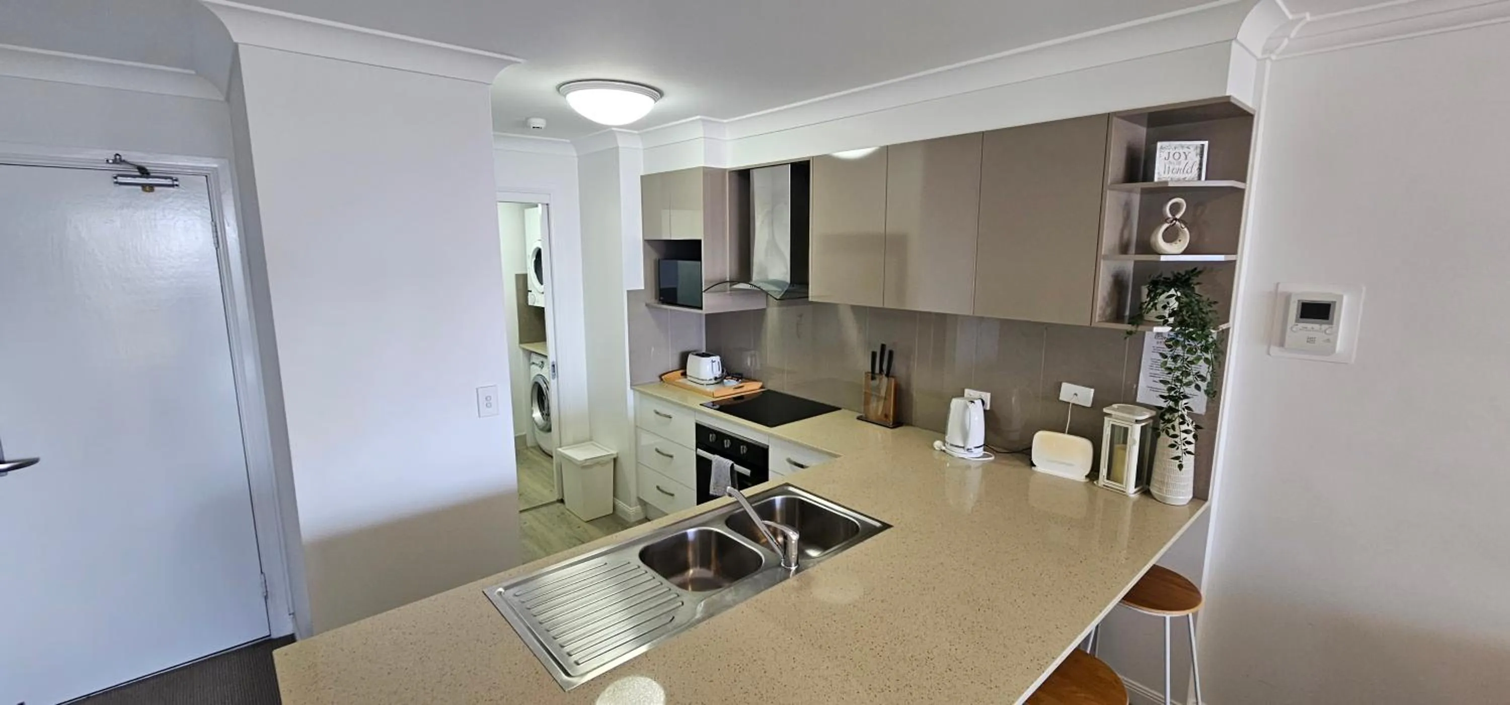 kitchen in Broadbeach Holiday Apartments