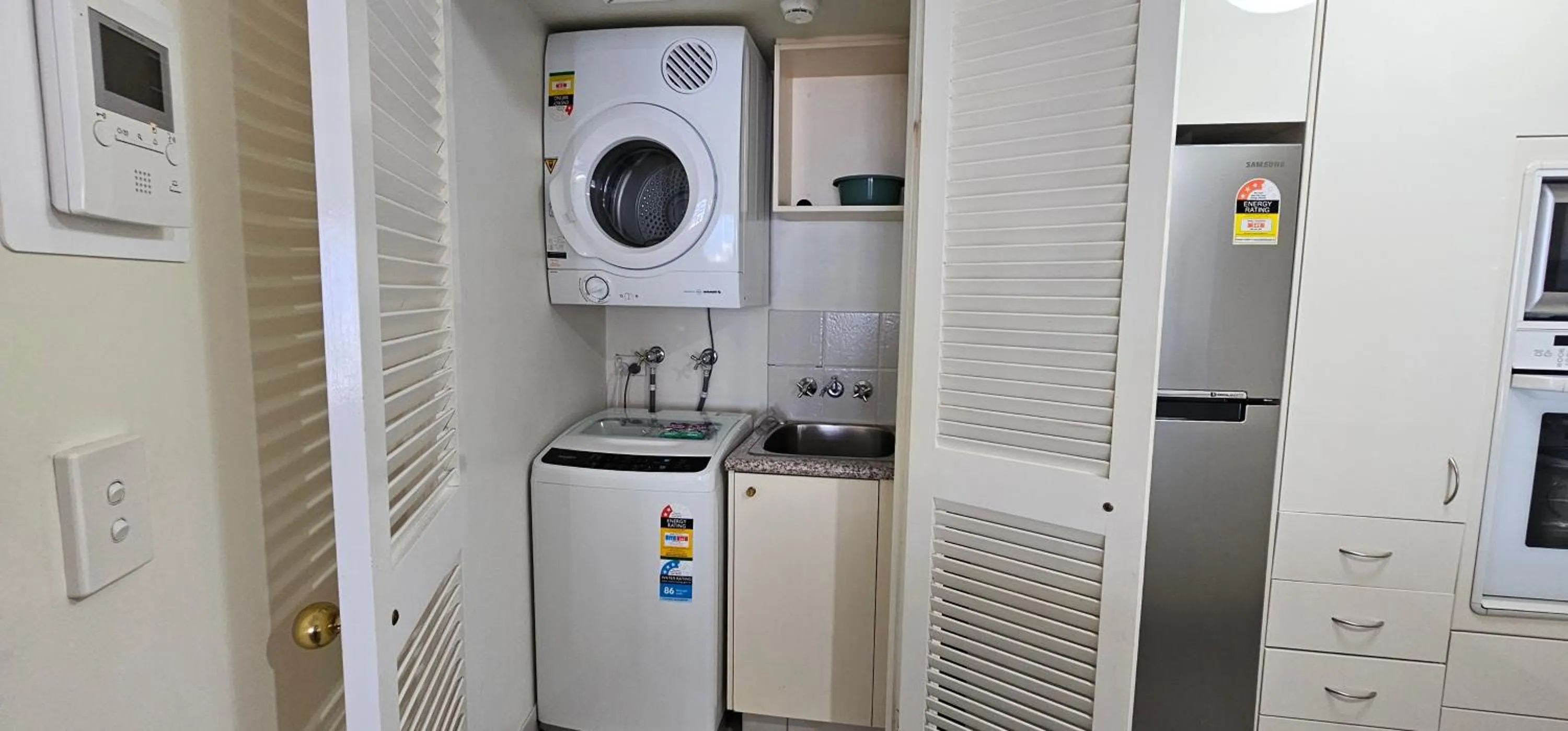 washing machine in Broadbeach Holiday Apartments