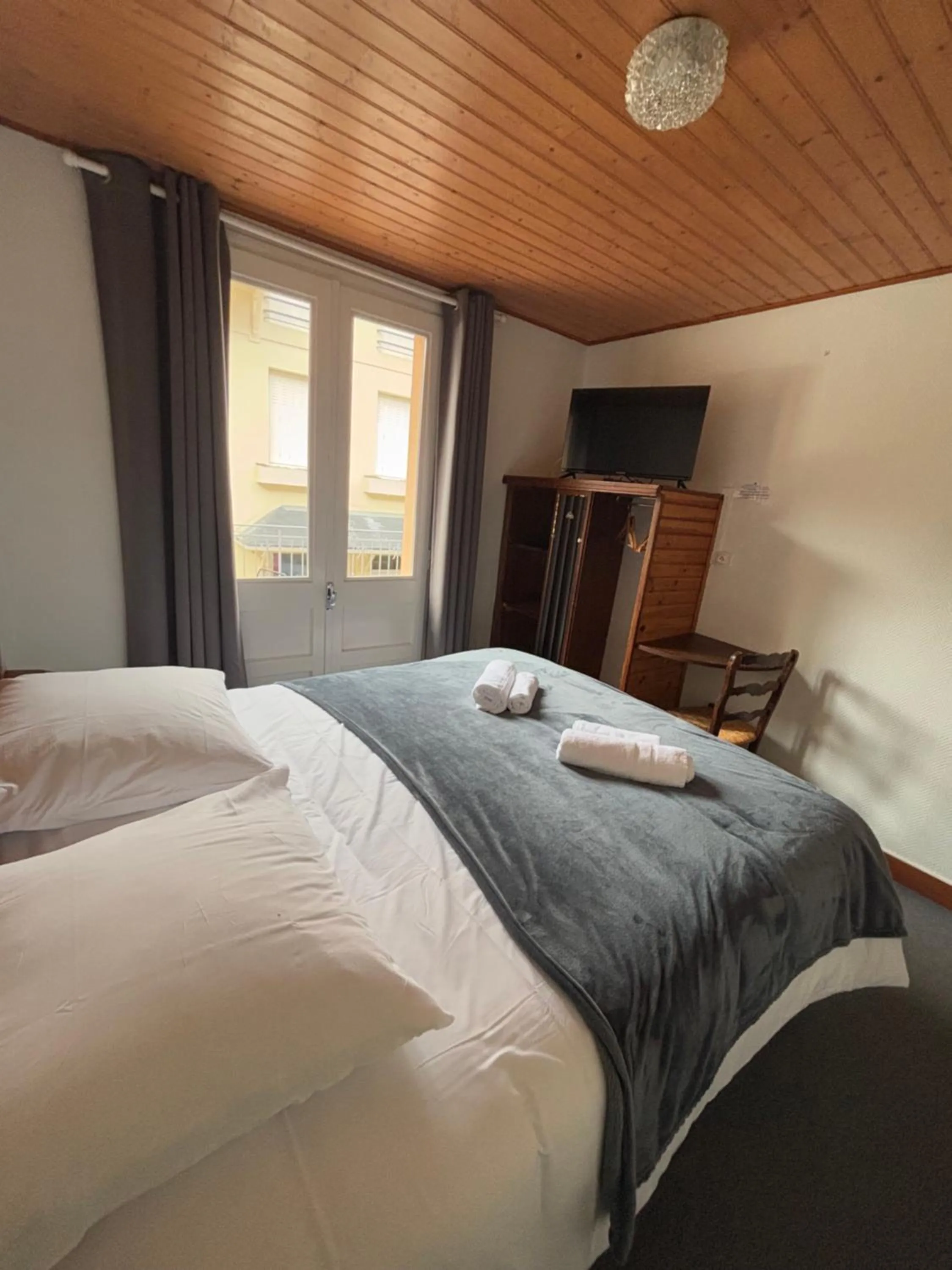 Bed in Hotel le Taillon