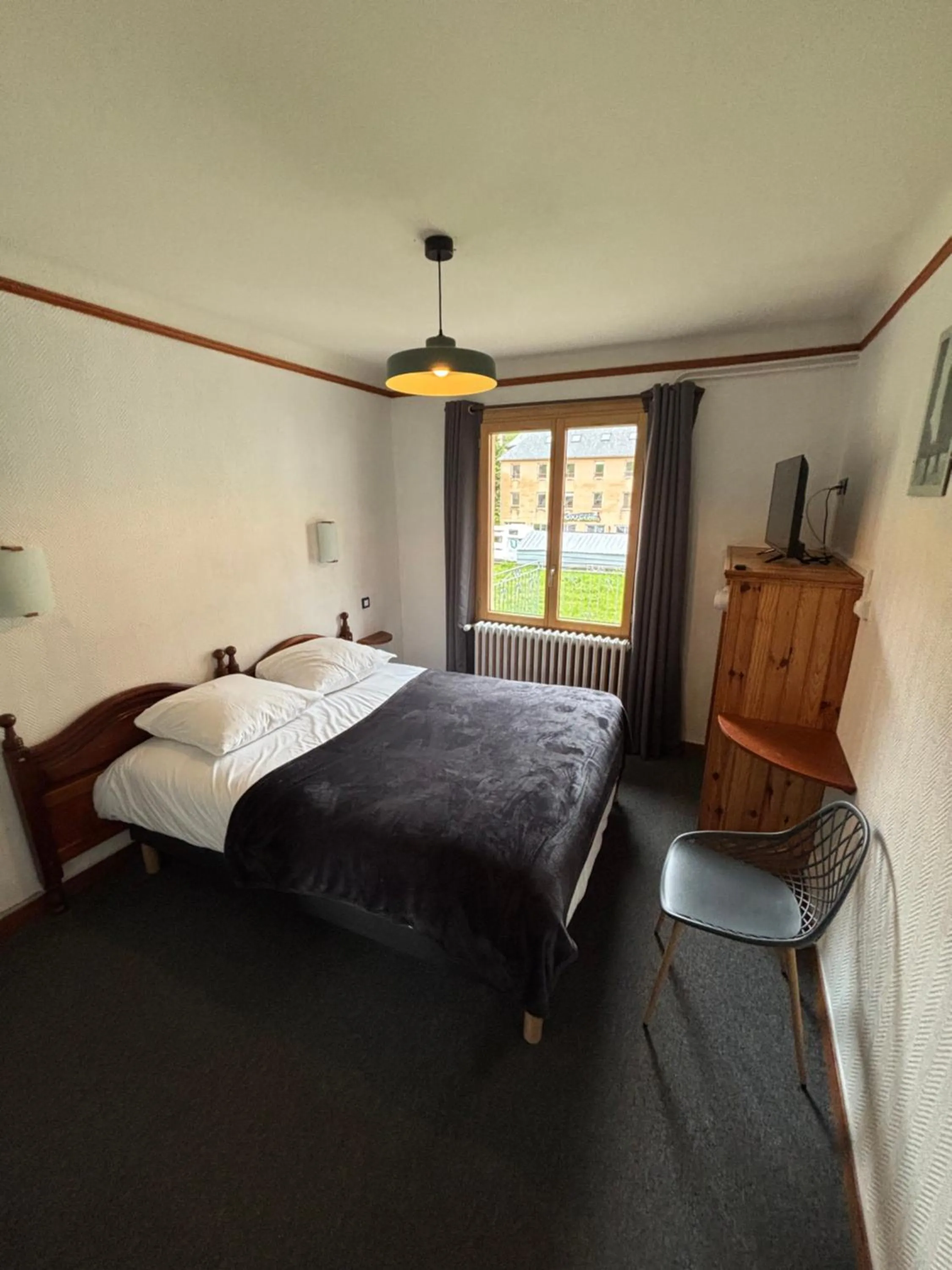 Bed in Hotel le Taillon