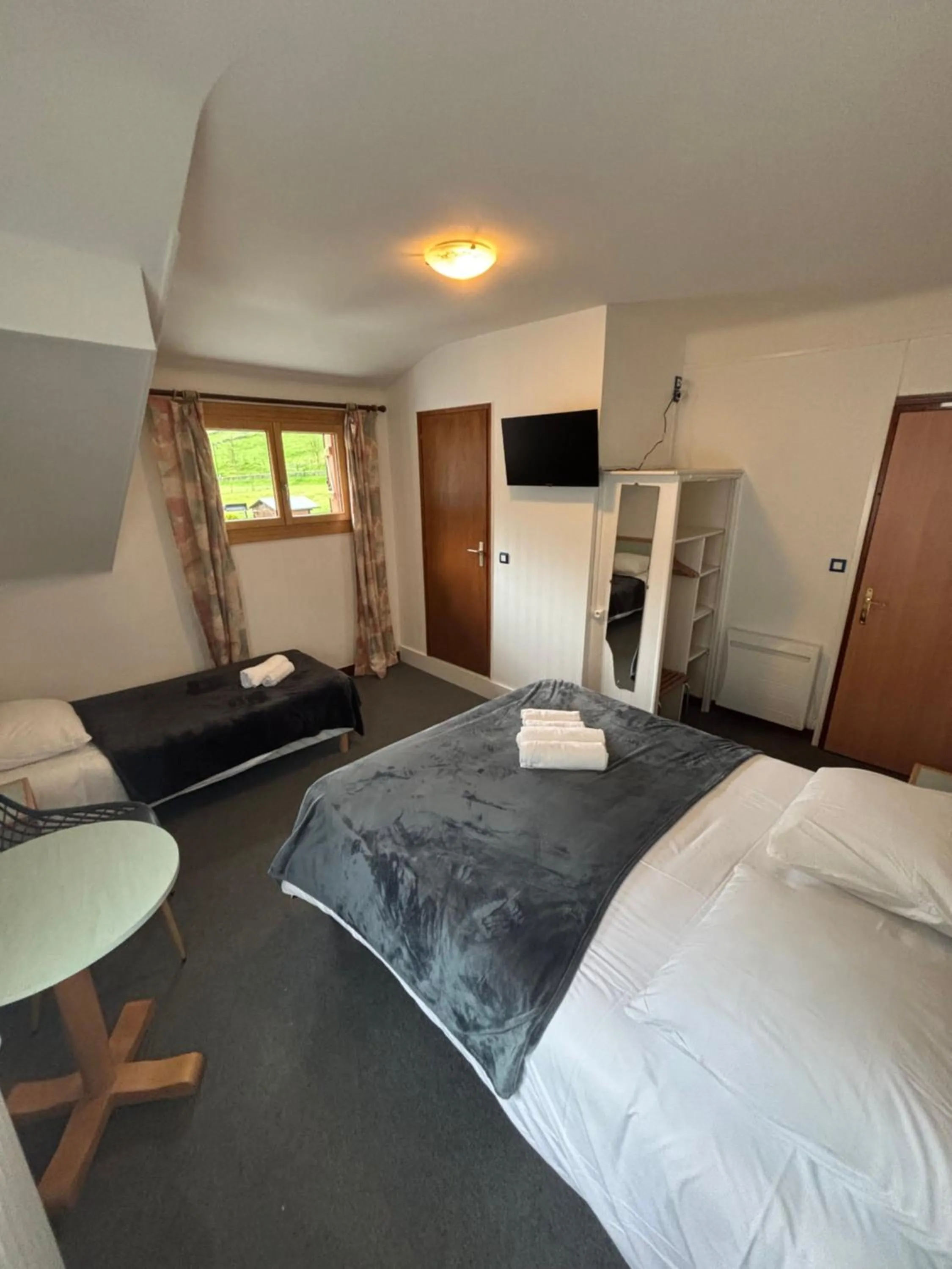 Bed in Hotel le Taillon