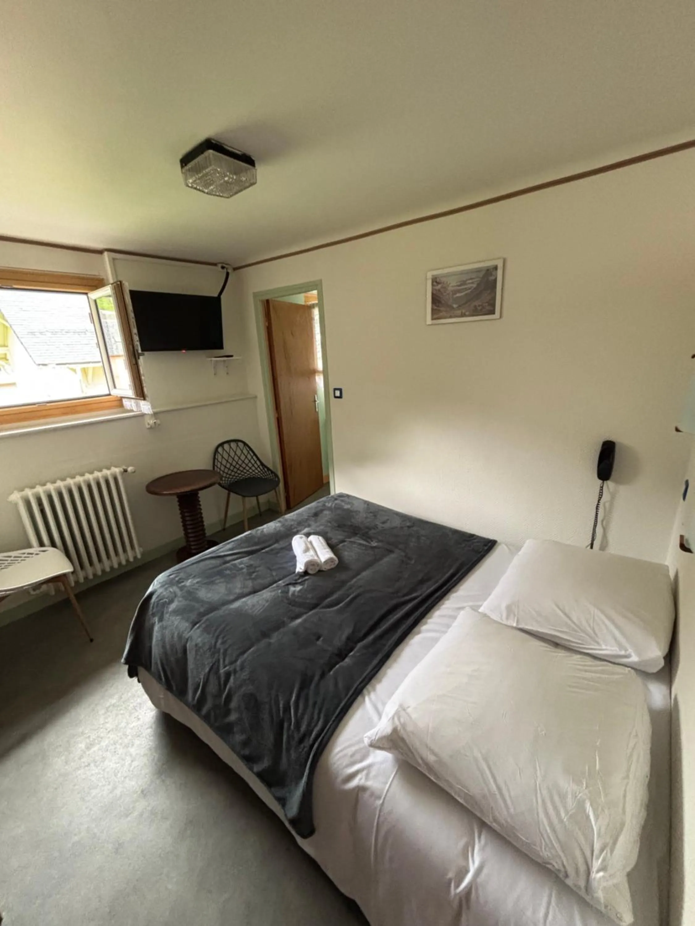 Bed in Hotel le Taillon