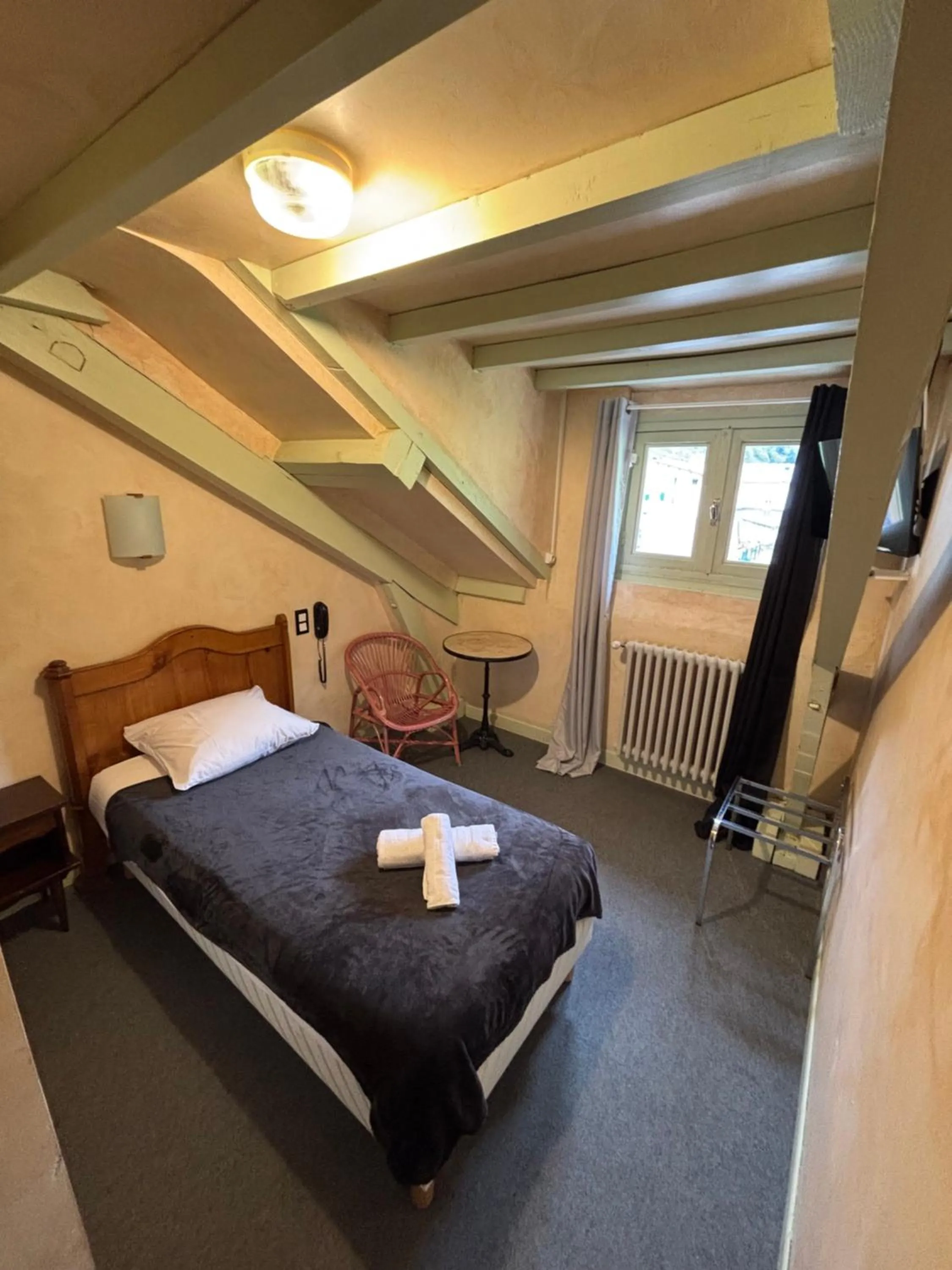 Bed in Hotel le Taillon