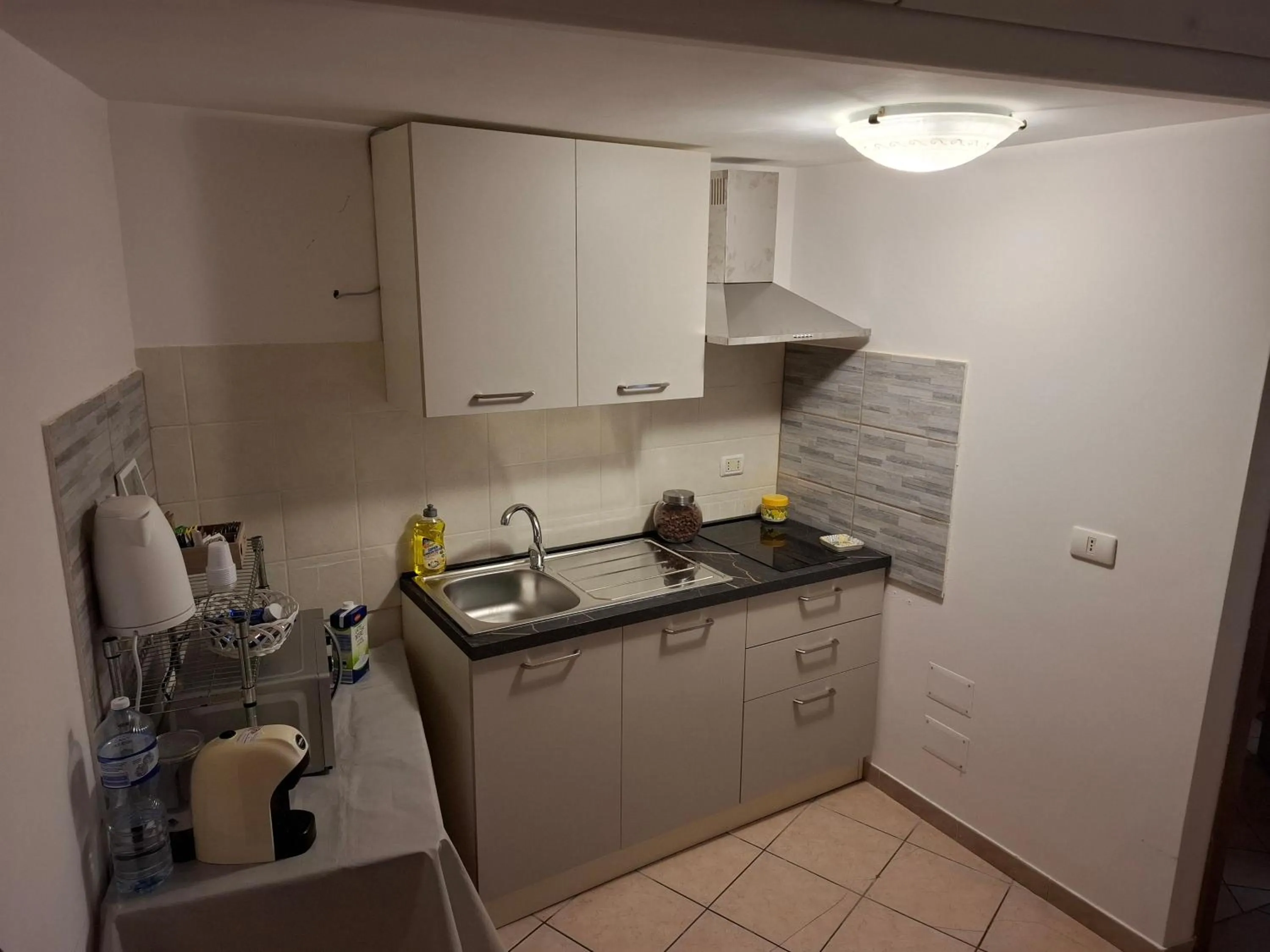 kitchen in Le Lumìe "Bed, Breakfast end Kitchen in the Room"