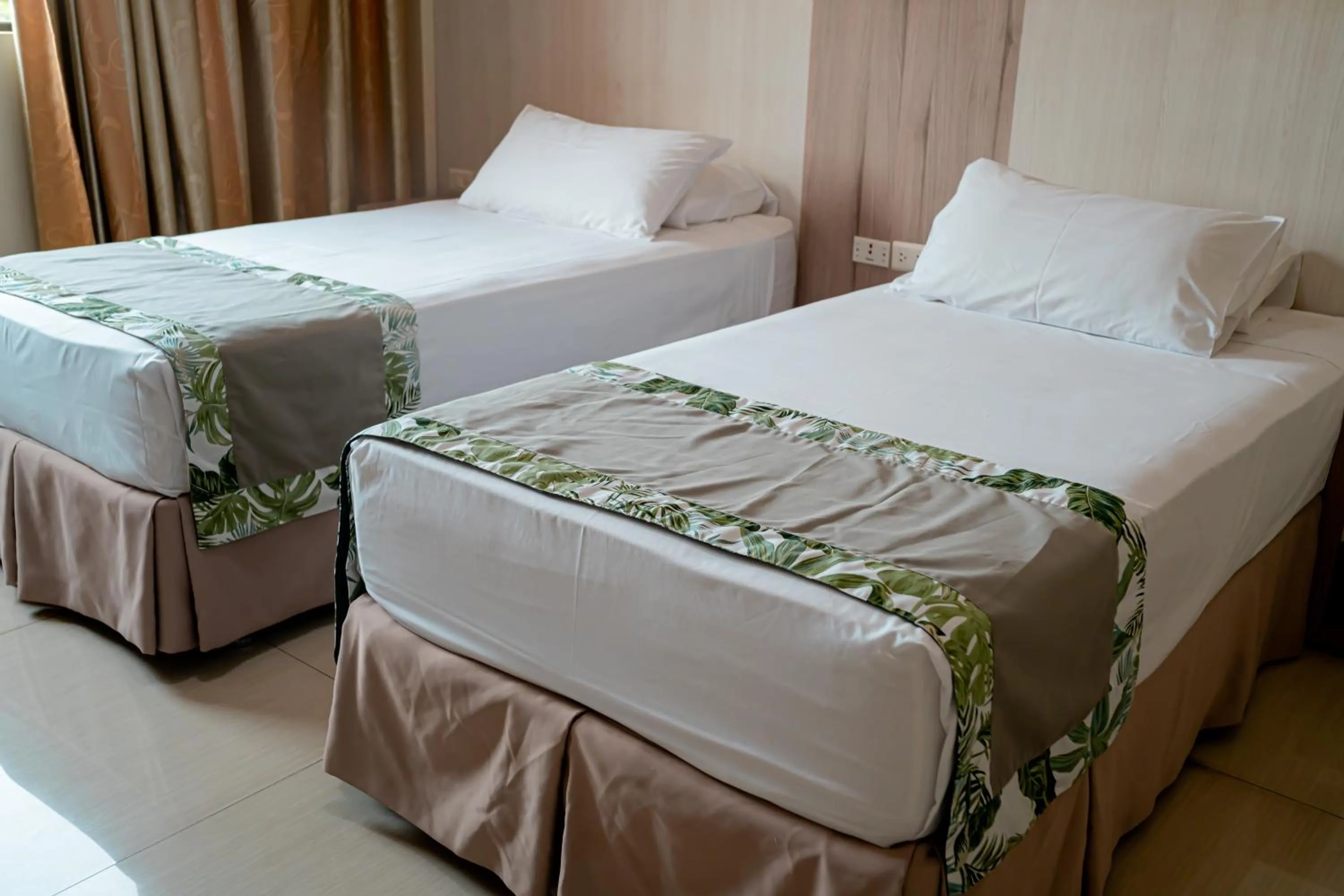 Bed in Megal Suites Hotel