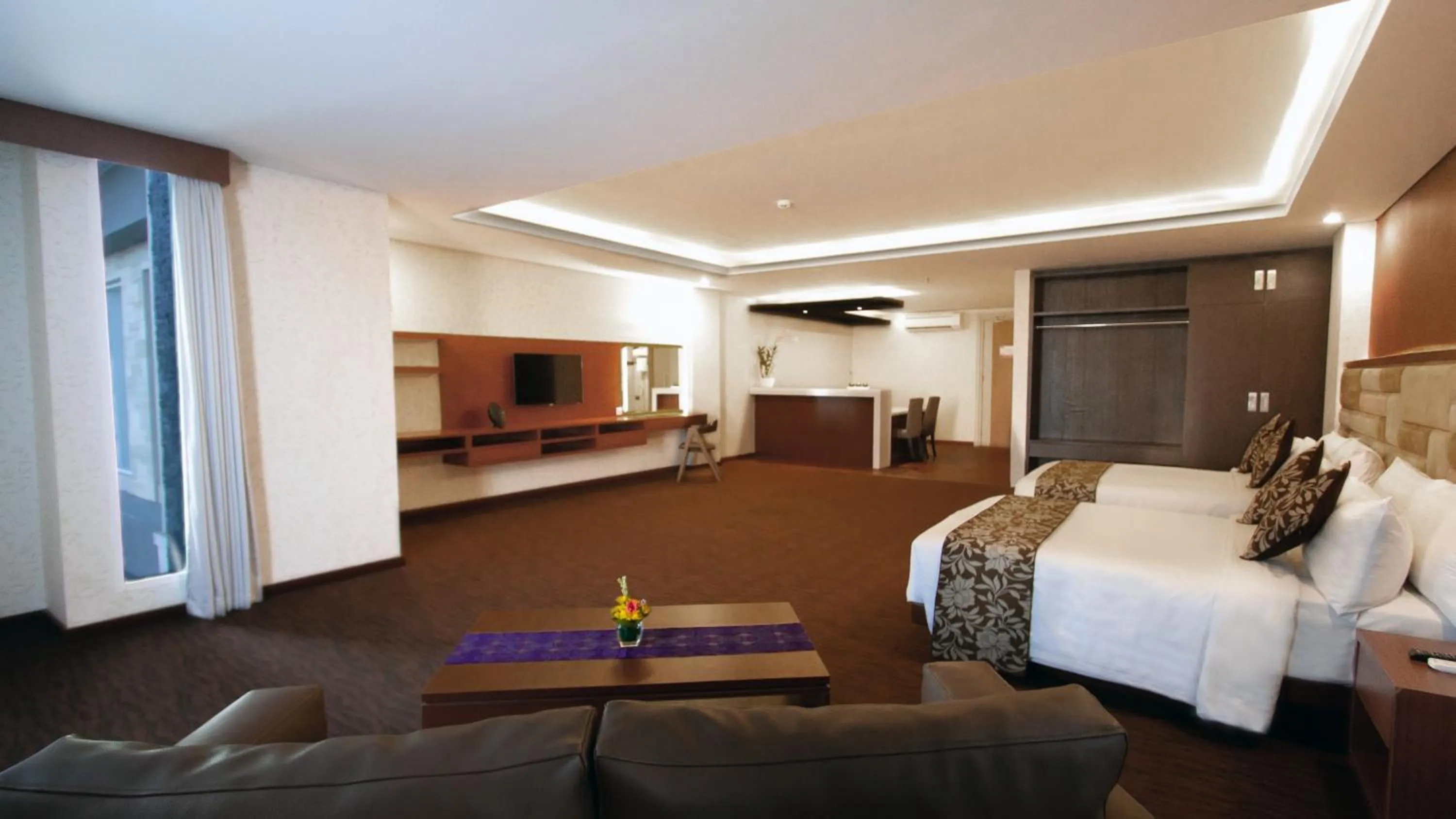 Photo of the whole room, Bed in Quest San Denpasar by ASTON
