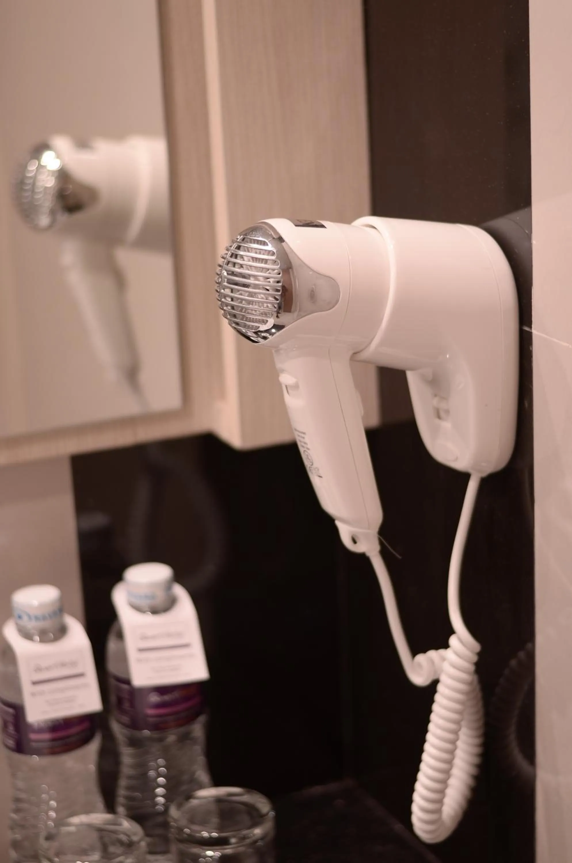 Bathroom in Quest San Denpasar by ASTON