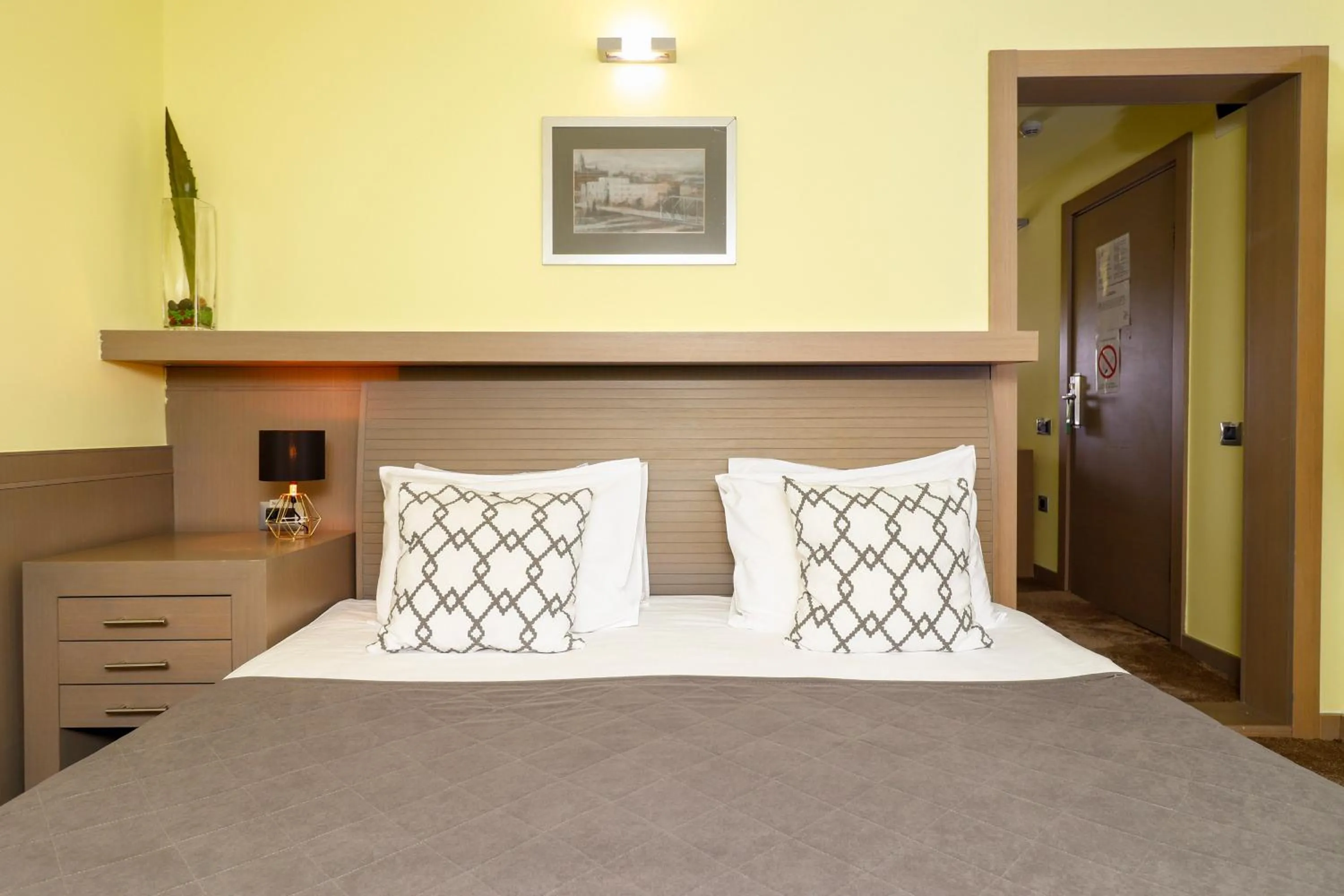 Bed in Garni Hotel Leopold I