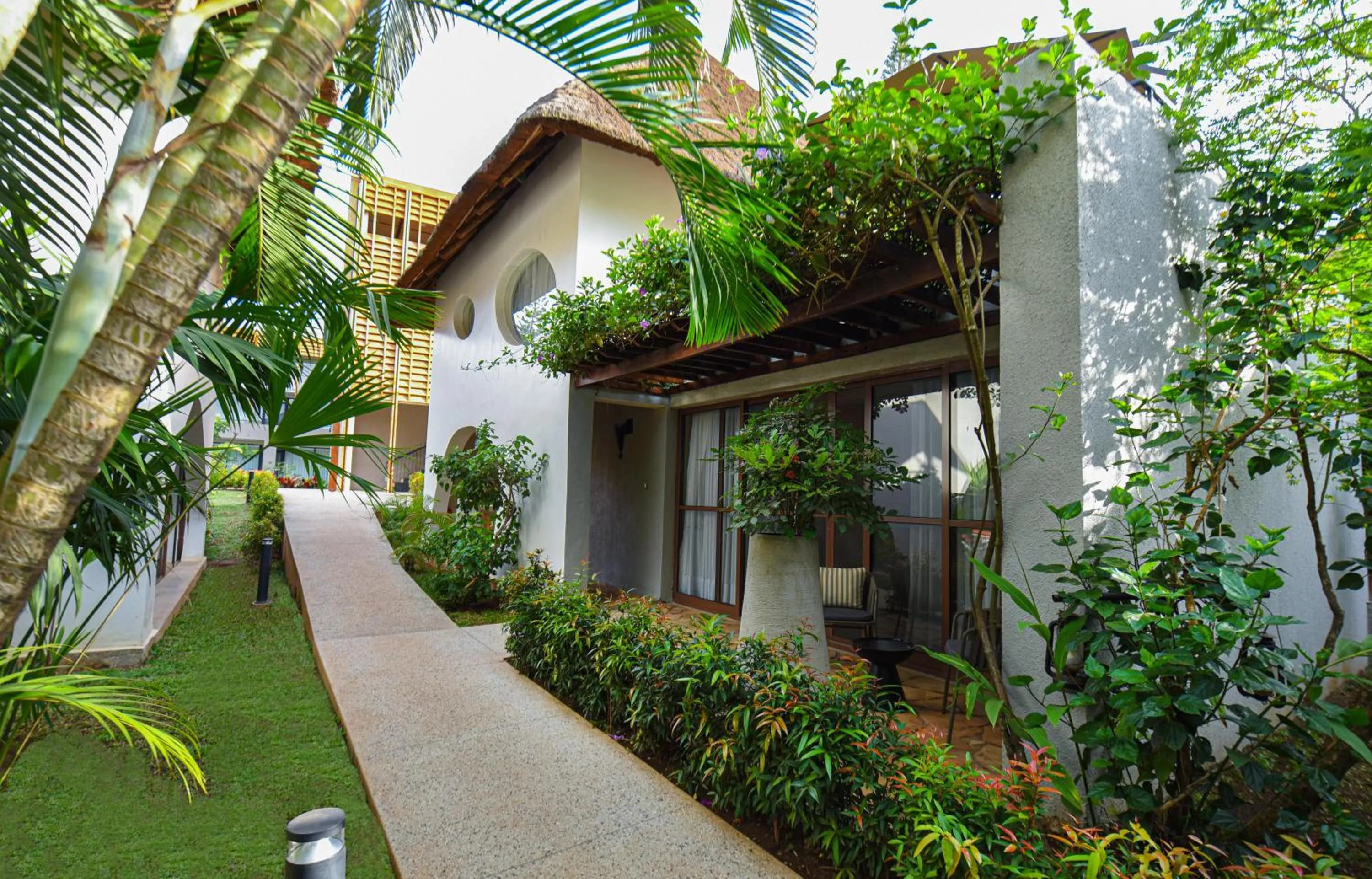 Property building in Le Petit Village Boutique Hotel & Spa