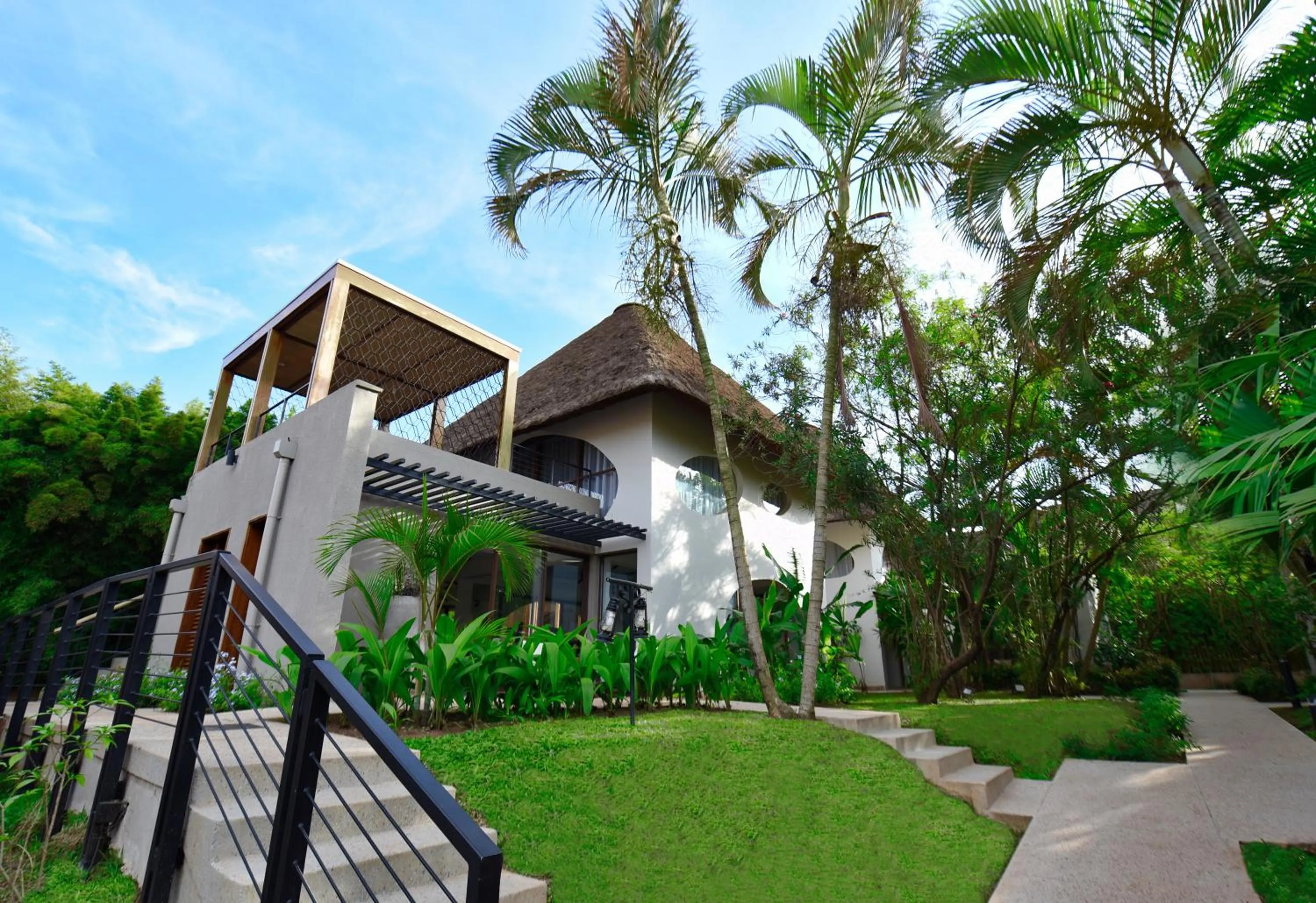 Property building in Le Petit Village Boutique Hotel & Spa