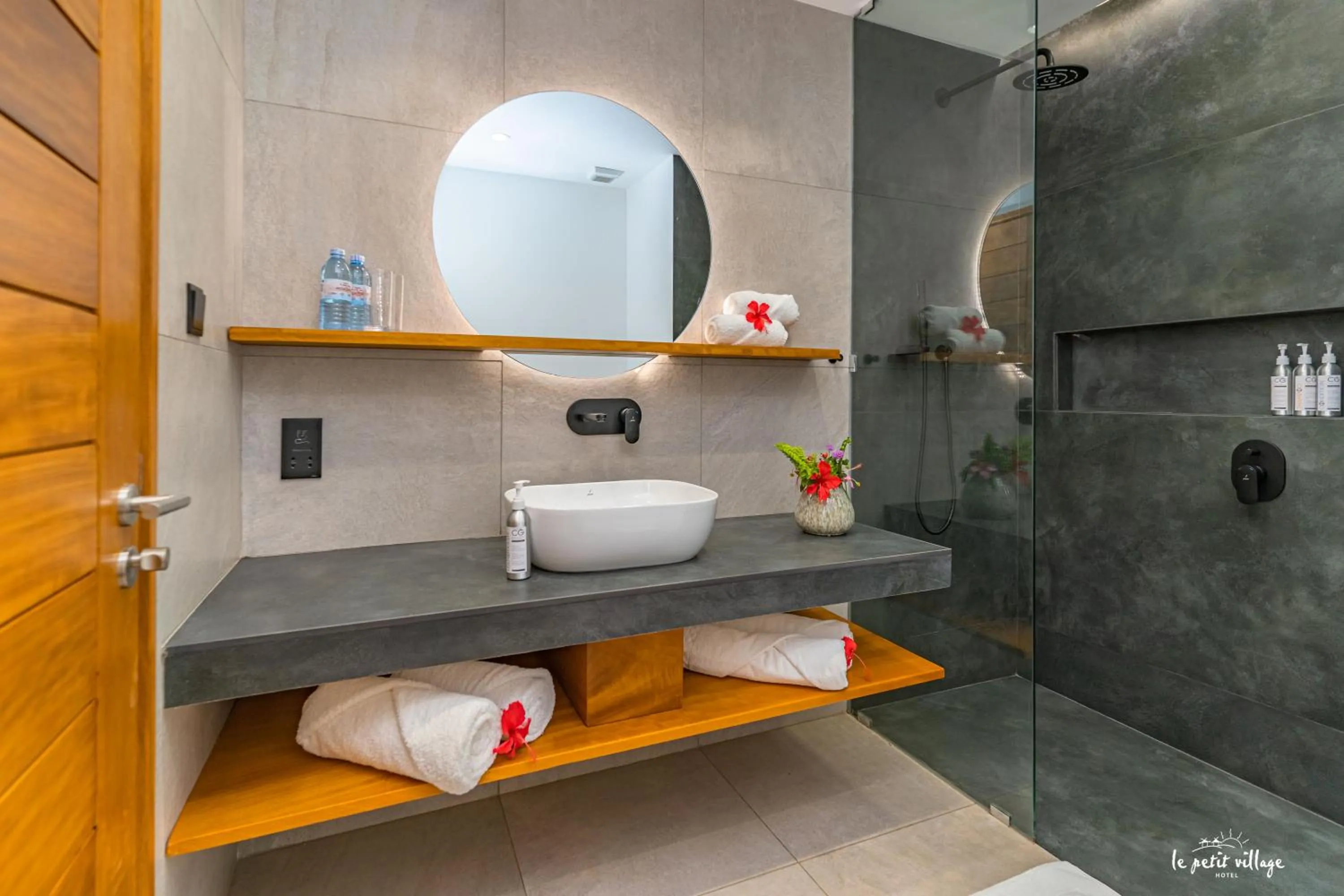 Bathroom in Le Petit Village Boutique Hotel & Spa