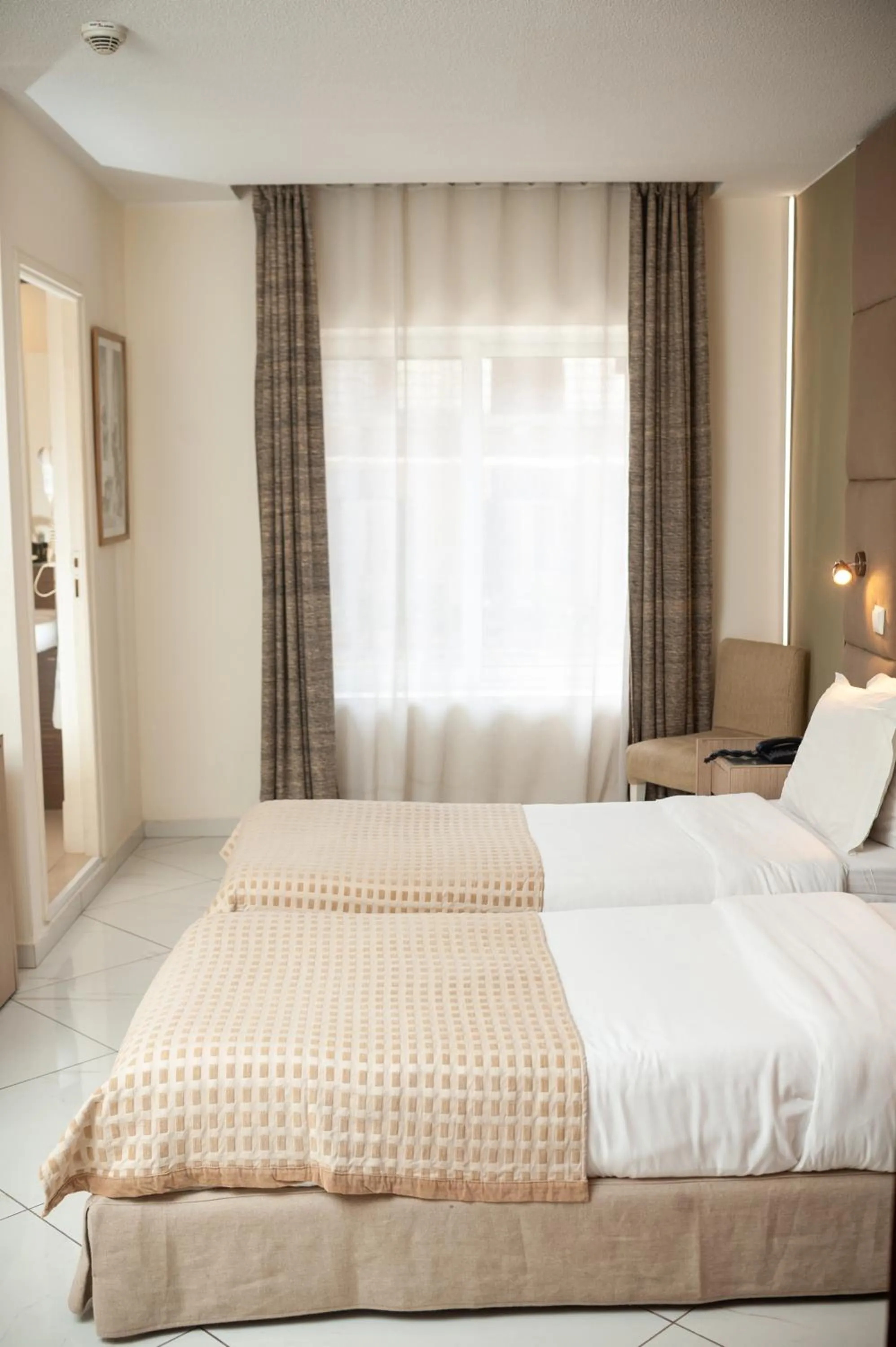 Bed in Le Grand Mellis Hôtel & Spa