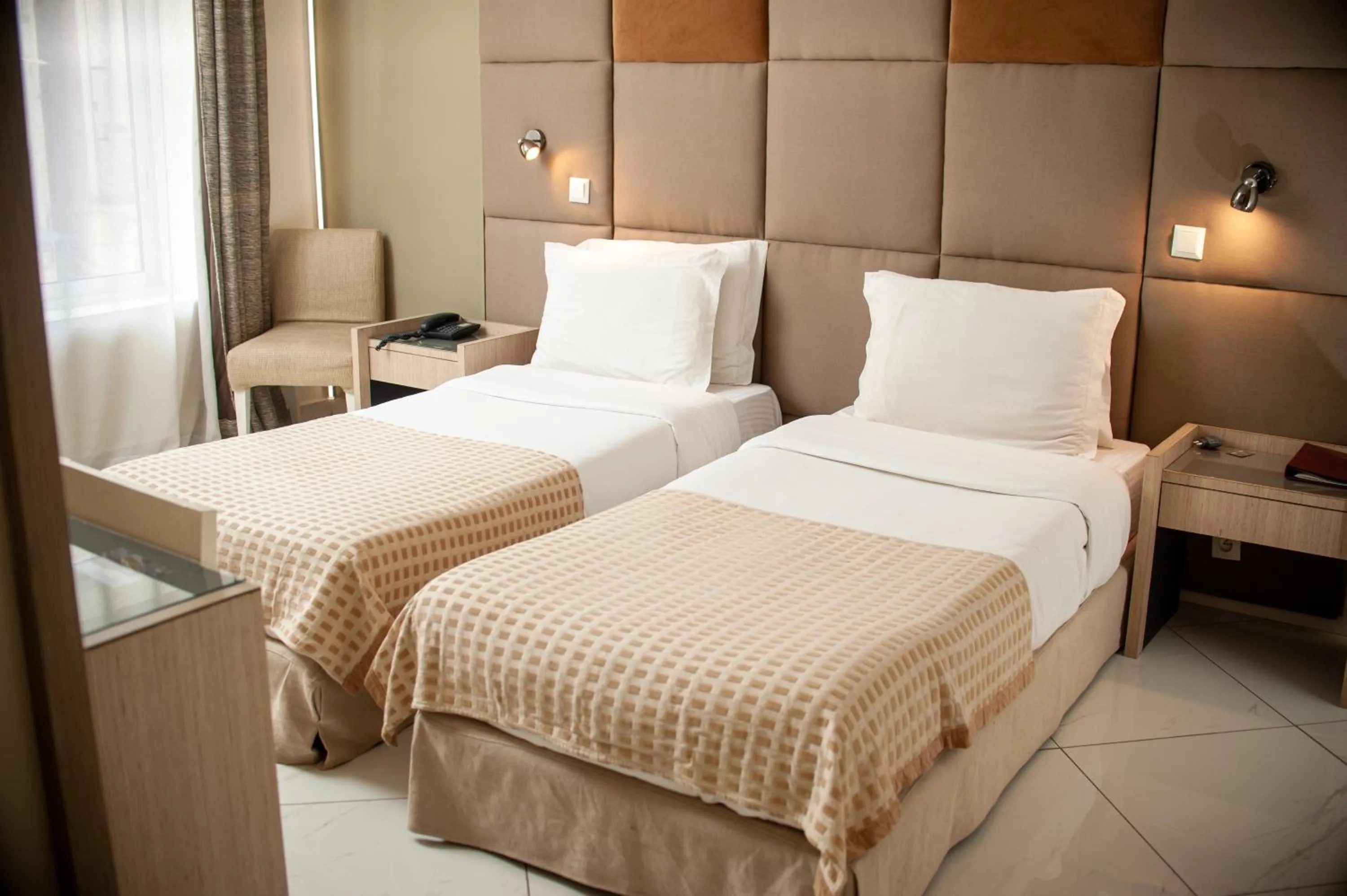 Bed in Le Grand Mellis Hôtel & Spa