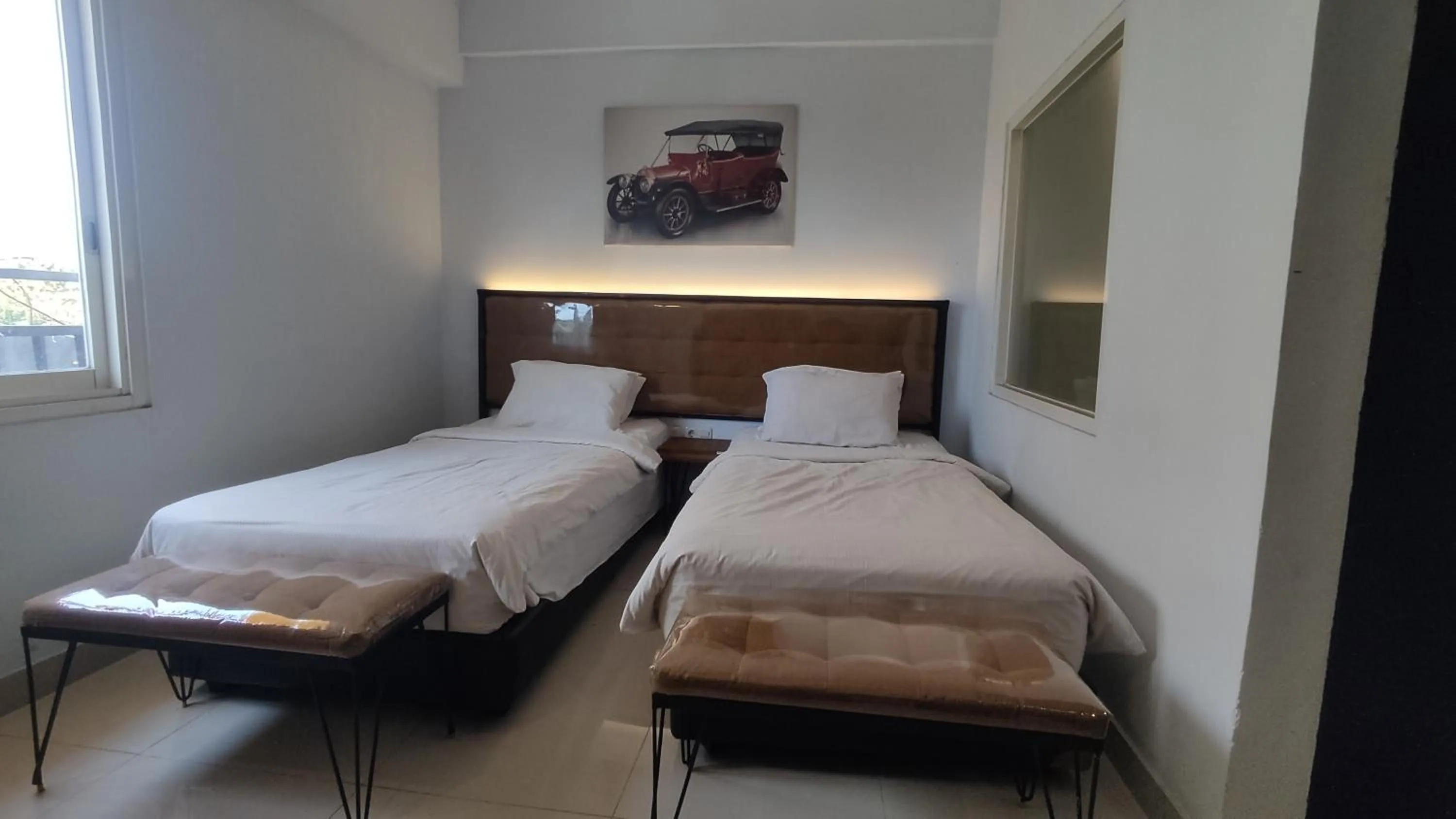 Bedroom, Bed in De La Charis Hotel by Waringin Hospitality