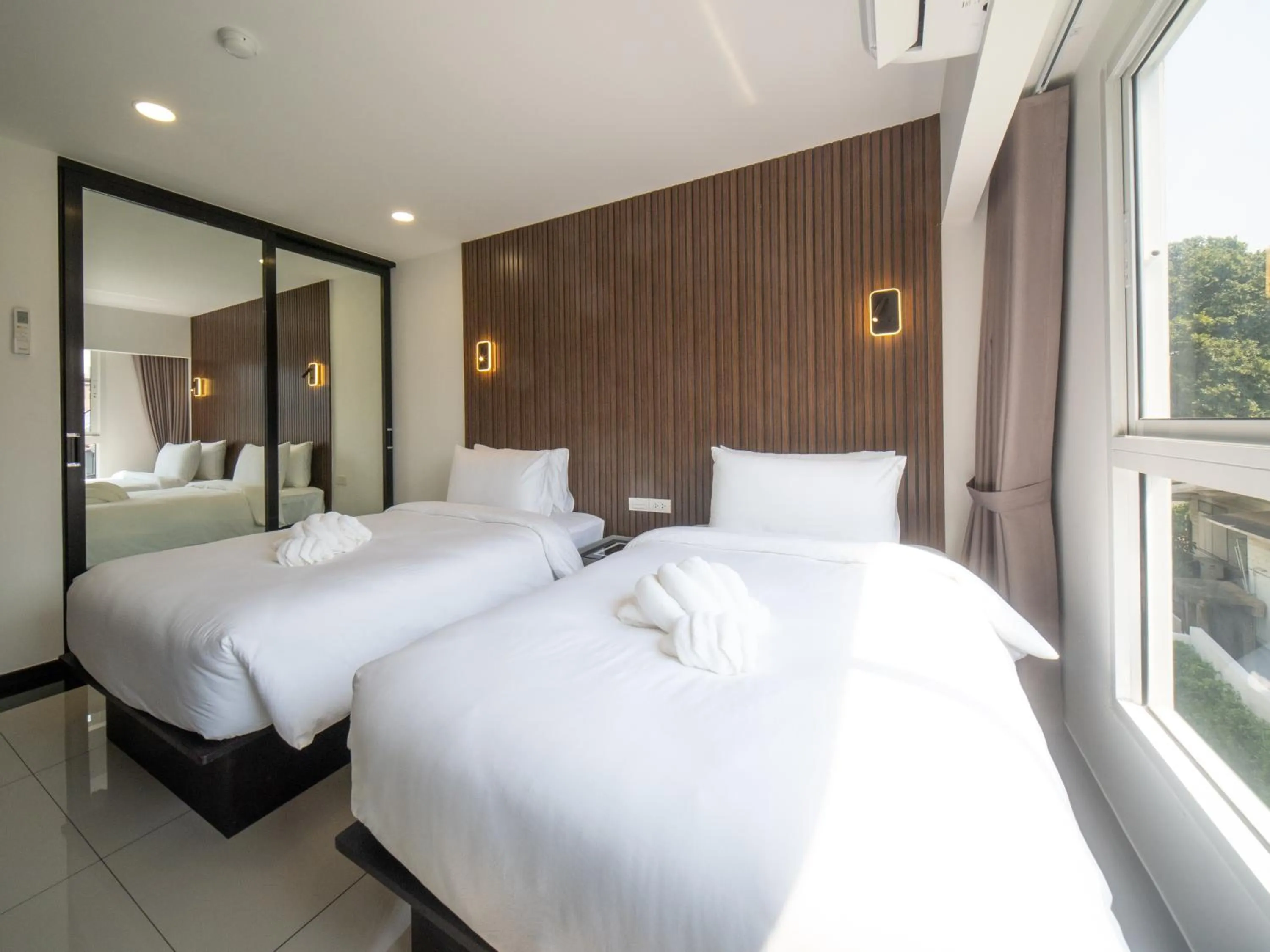 Bed in Samutprakarn Hotel