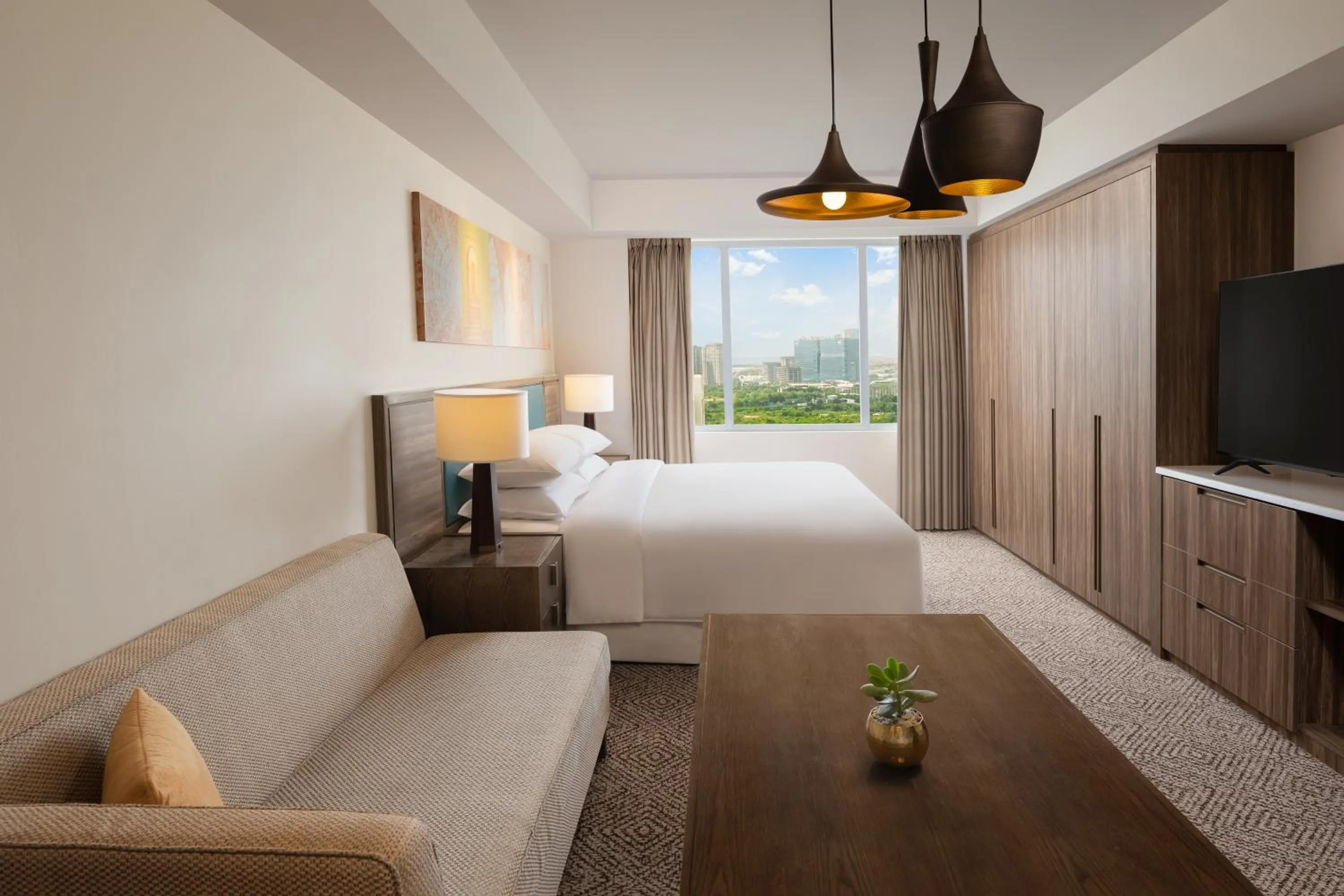 Living room, Bed in Sheraton Hyderabad Hotel