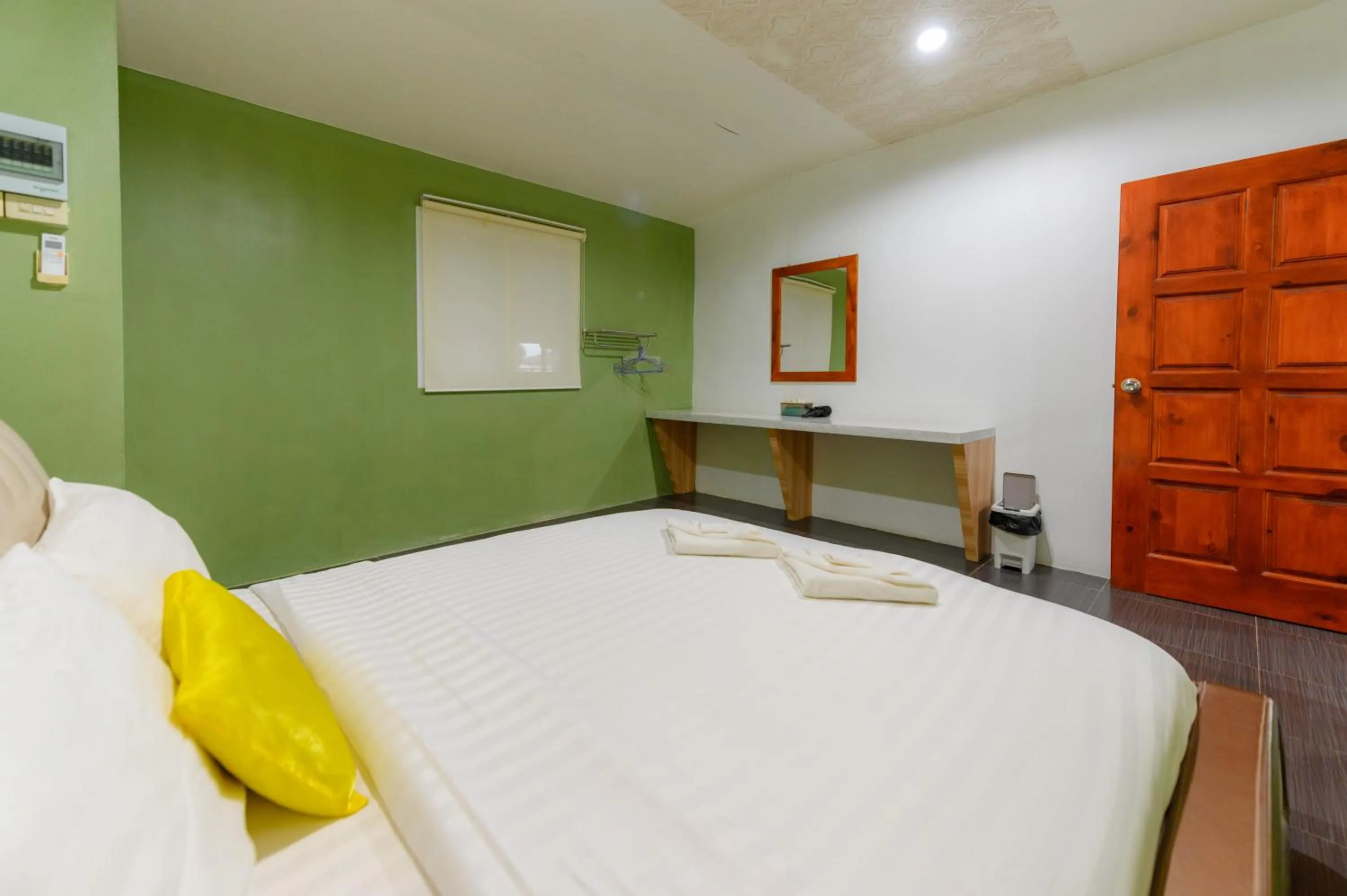 Bed in Kongkhamkoon Hotel