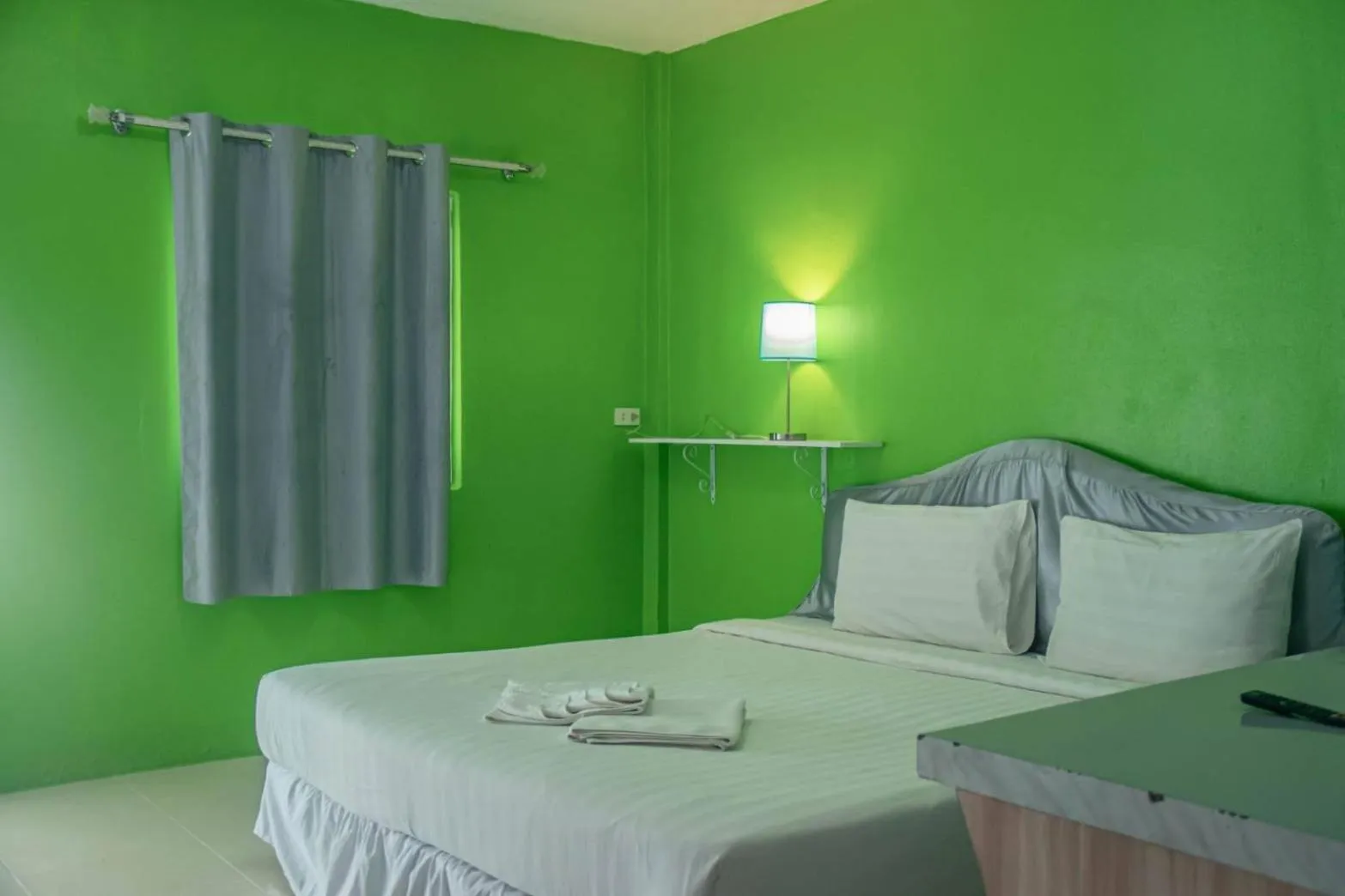 Bed in Kongkhamkoon Hotel