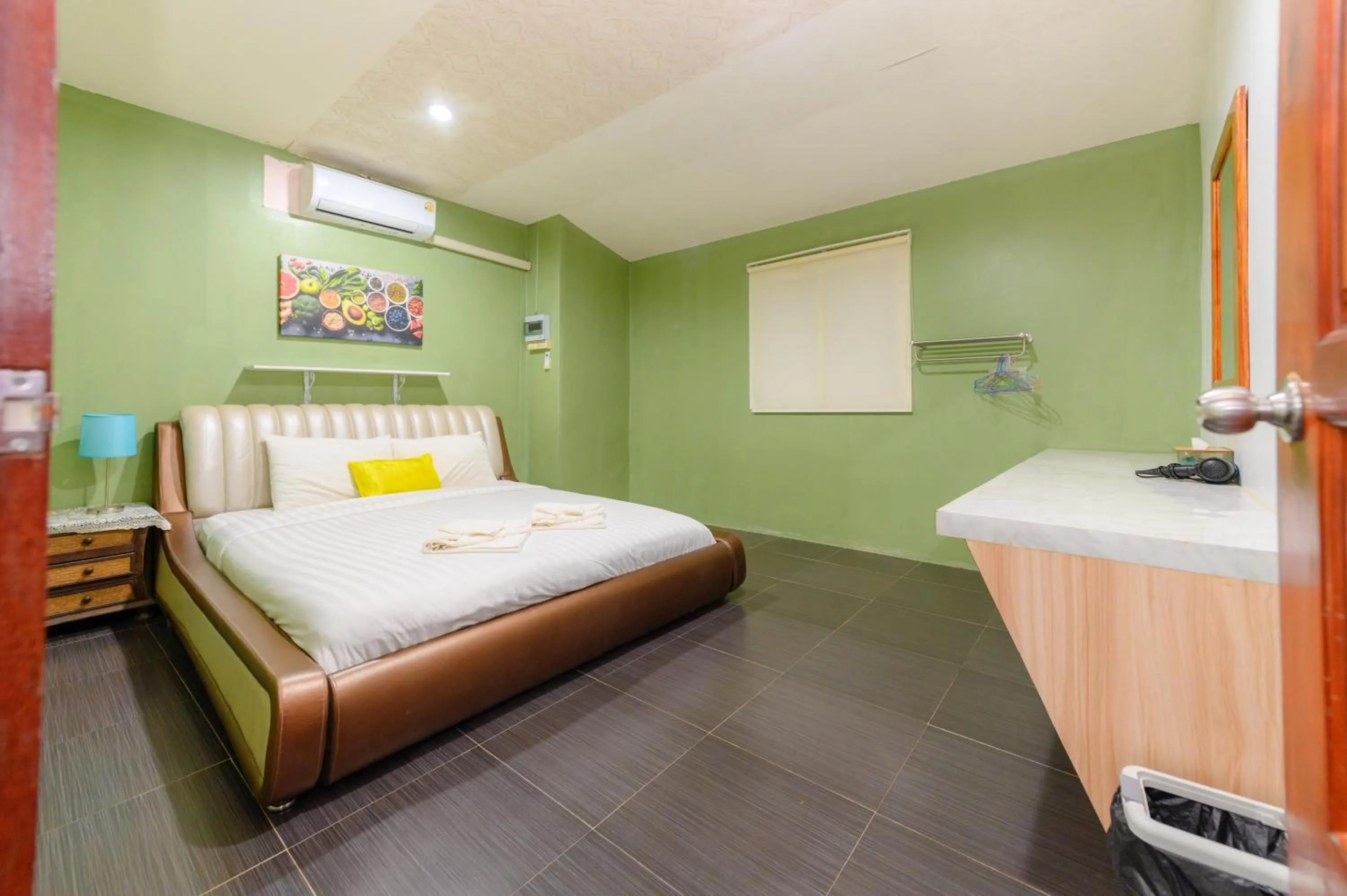 Bed in Kongkhamkoon Hotel