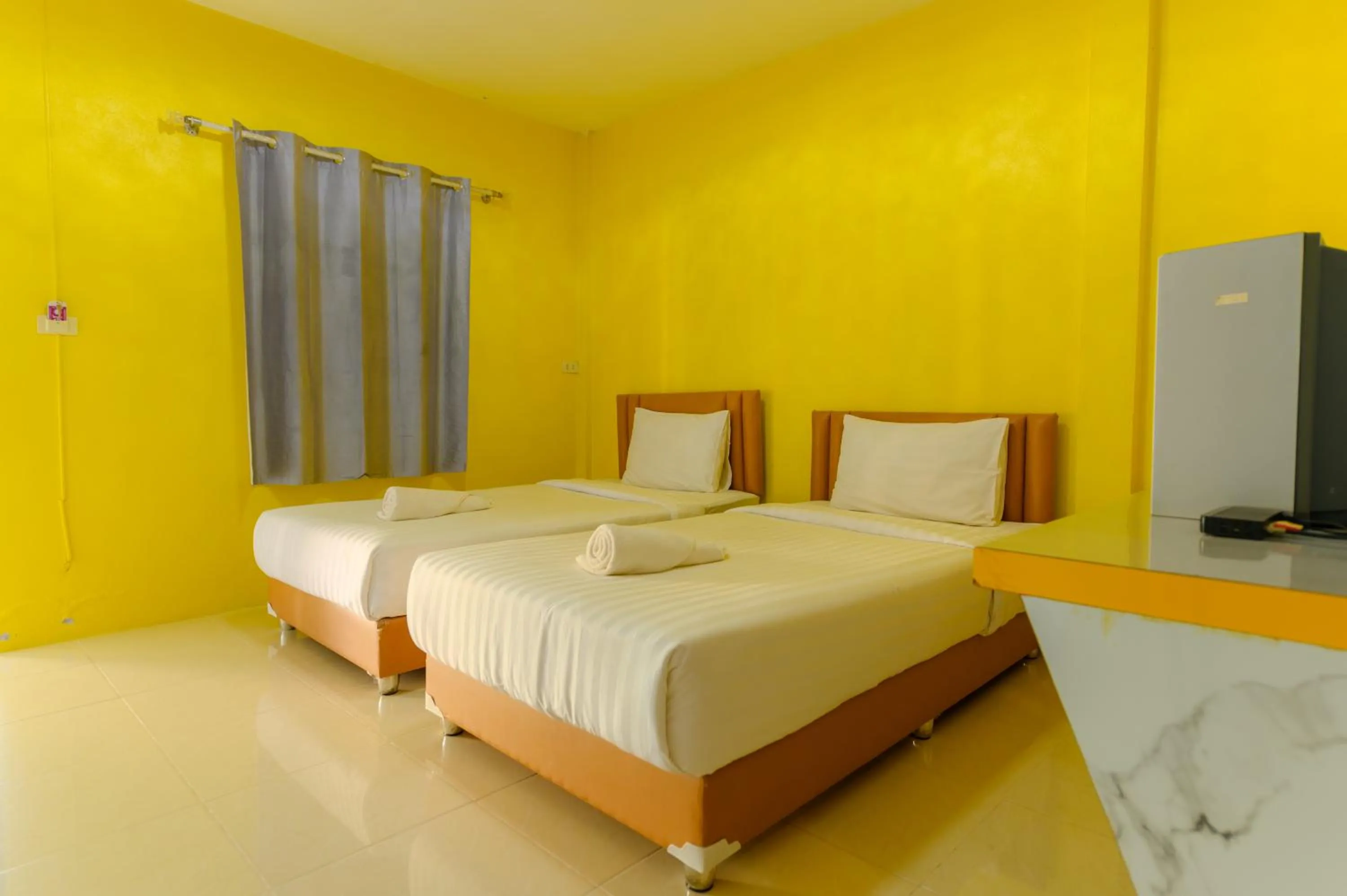 Bed in Kongkhamkoon Hotel