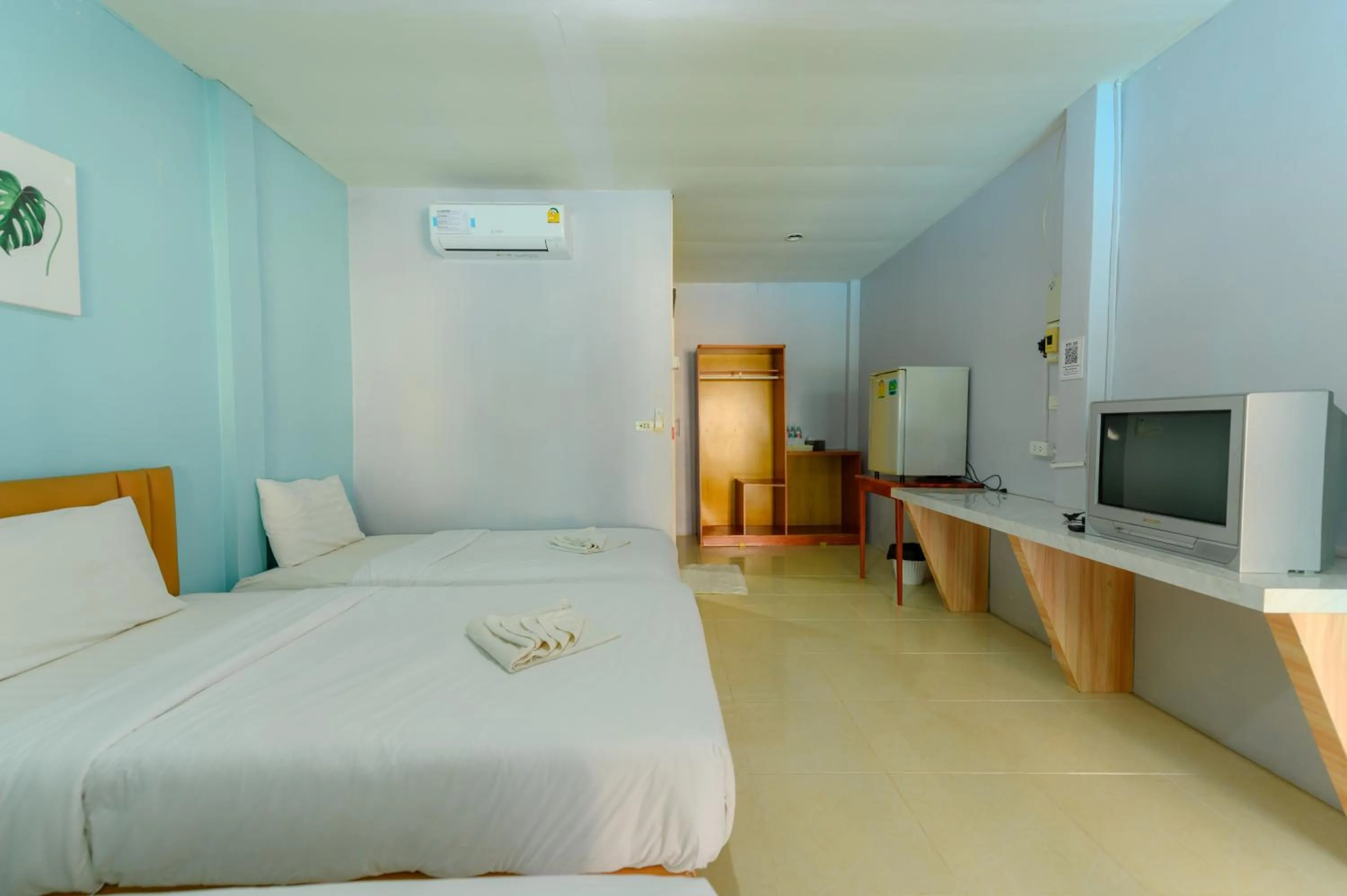 Bed in Kongkhamkoon Hotel