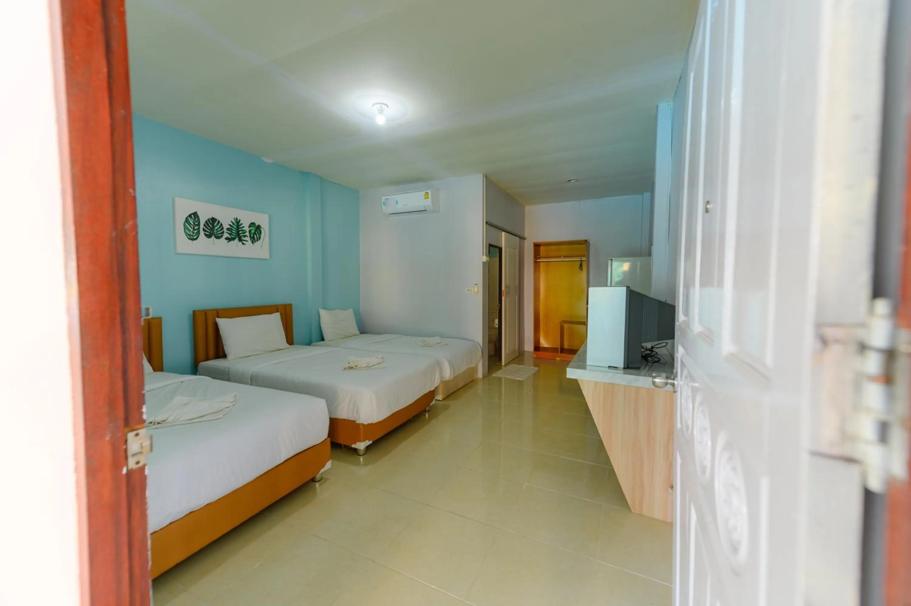 Bed in Kongkhamkoon Hotel