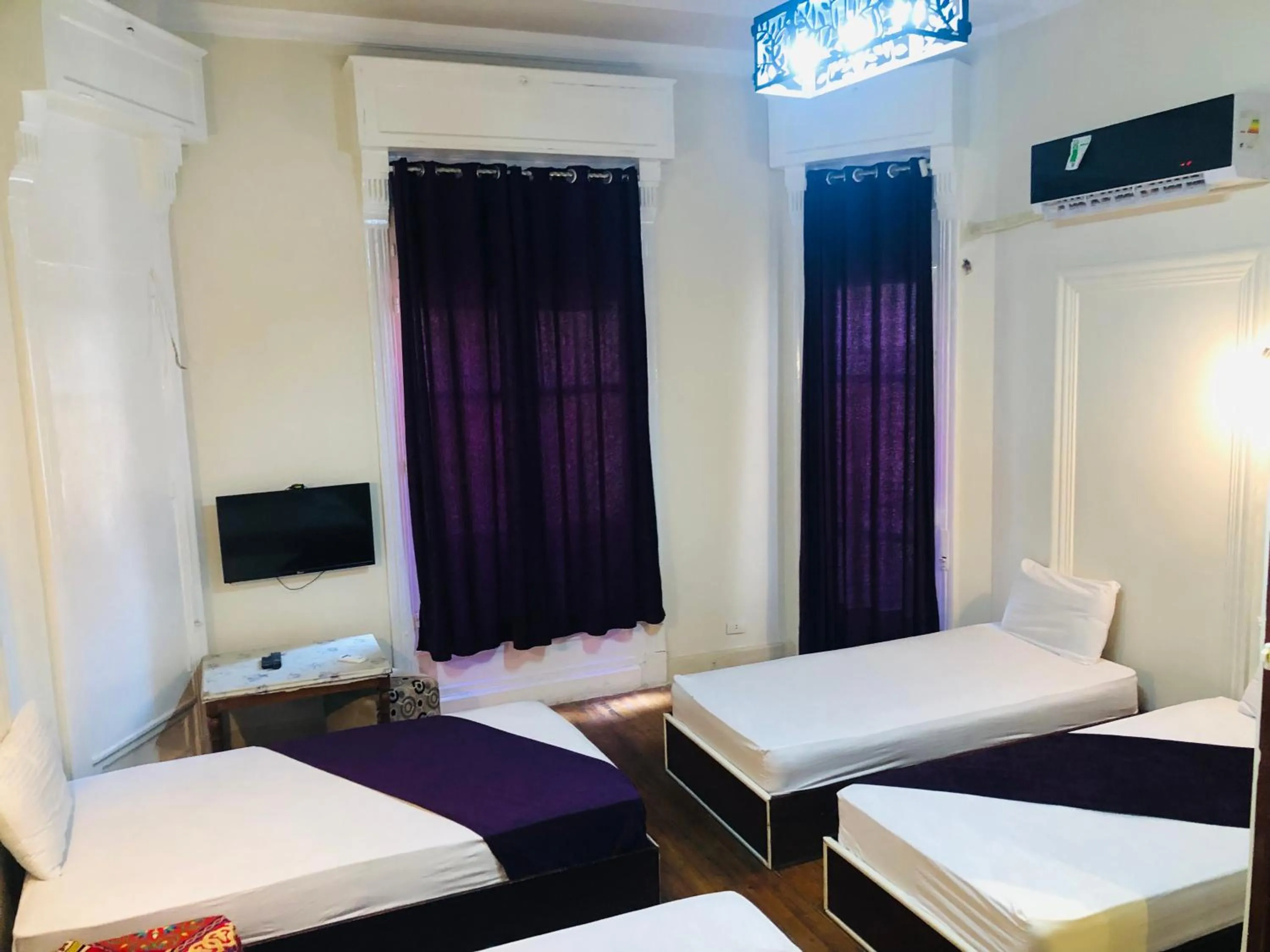 Communal lounge/ TV room, Bed in Mesho Cairo Hostel