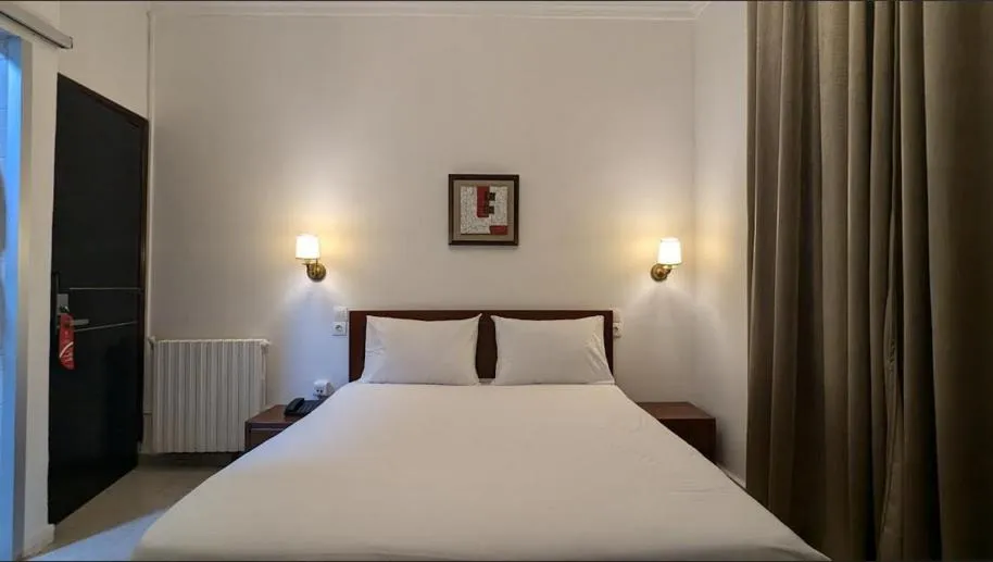 Bed in Telemly Hotel