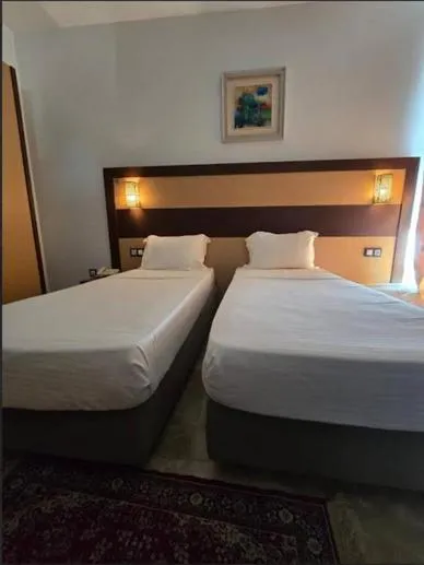 Bed in Telemly Hotel