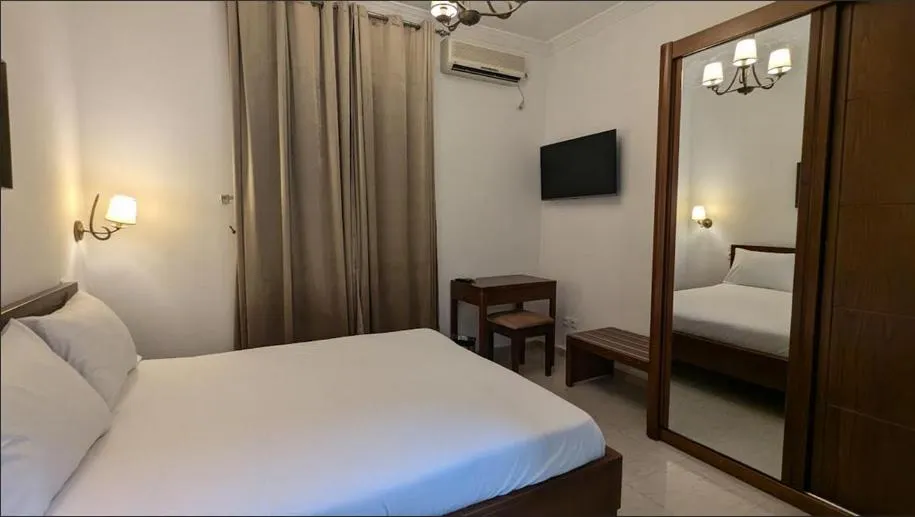 Bed in Telemly Hotel