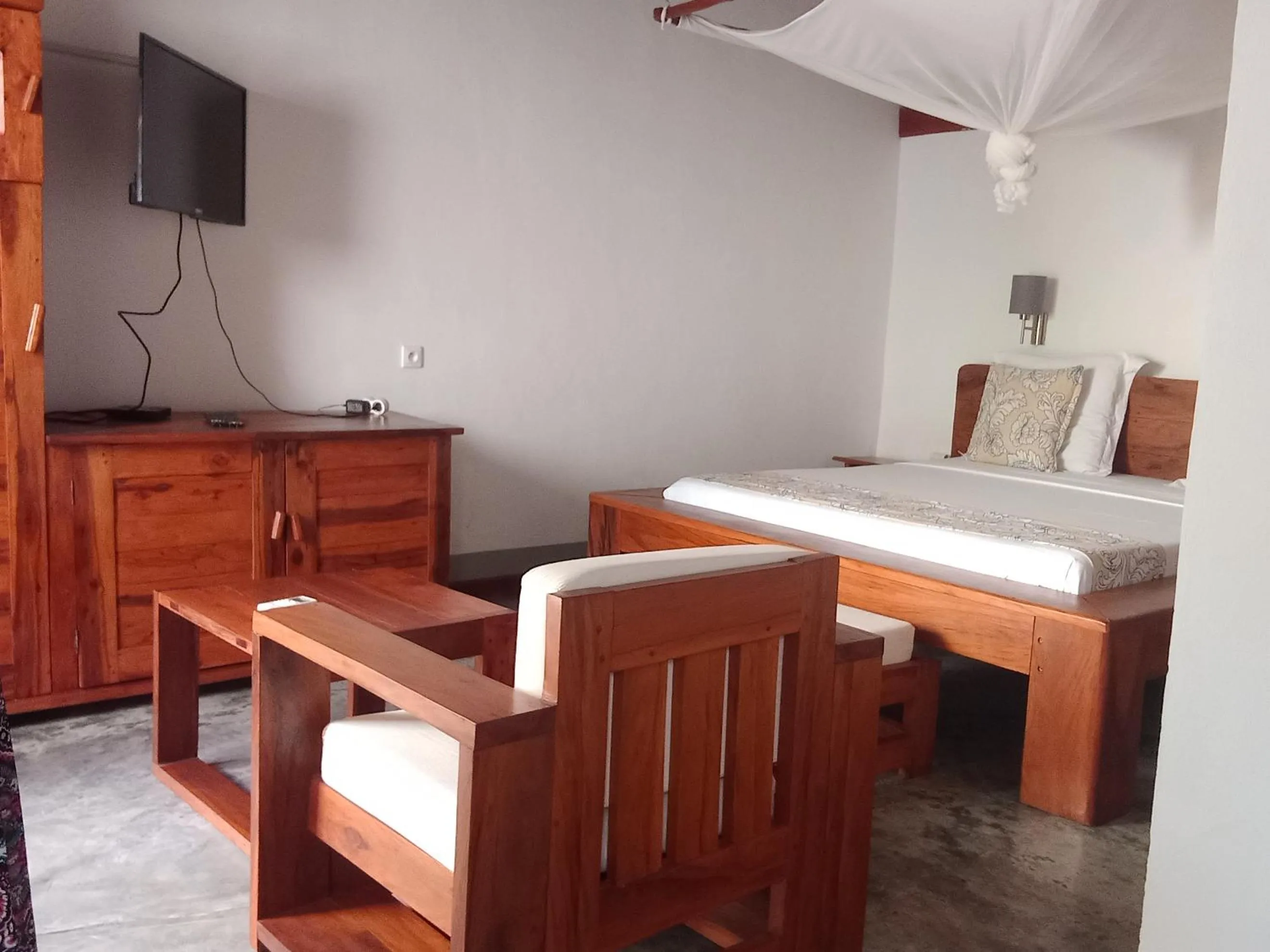 Seating area, Bed in Hotel Les Boucaniers