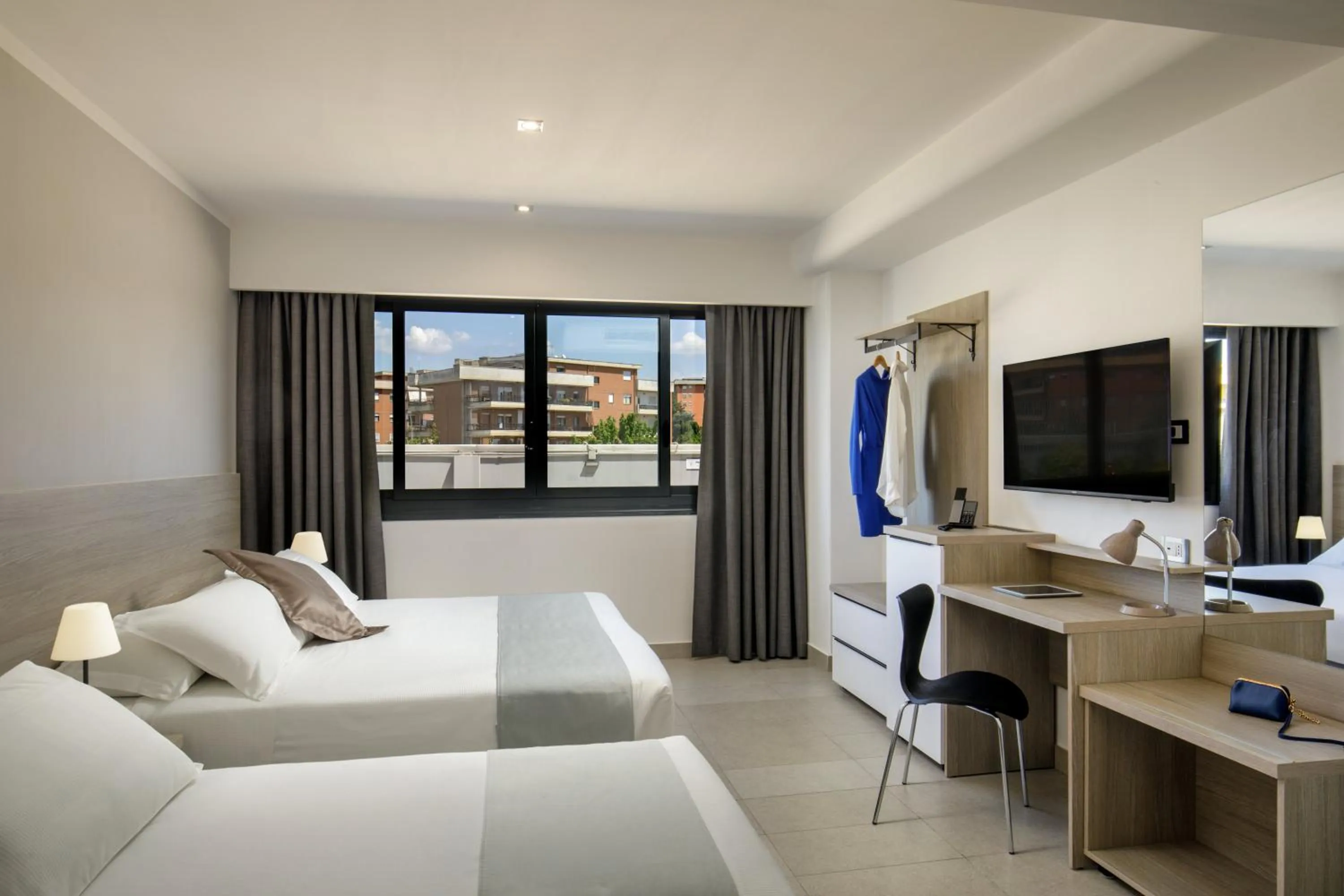 Bed in Simon Hotel Aprilia