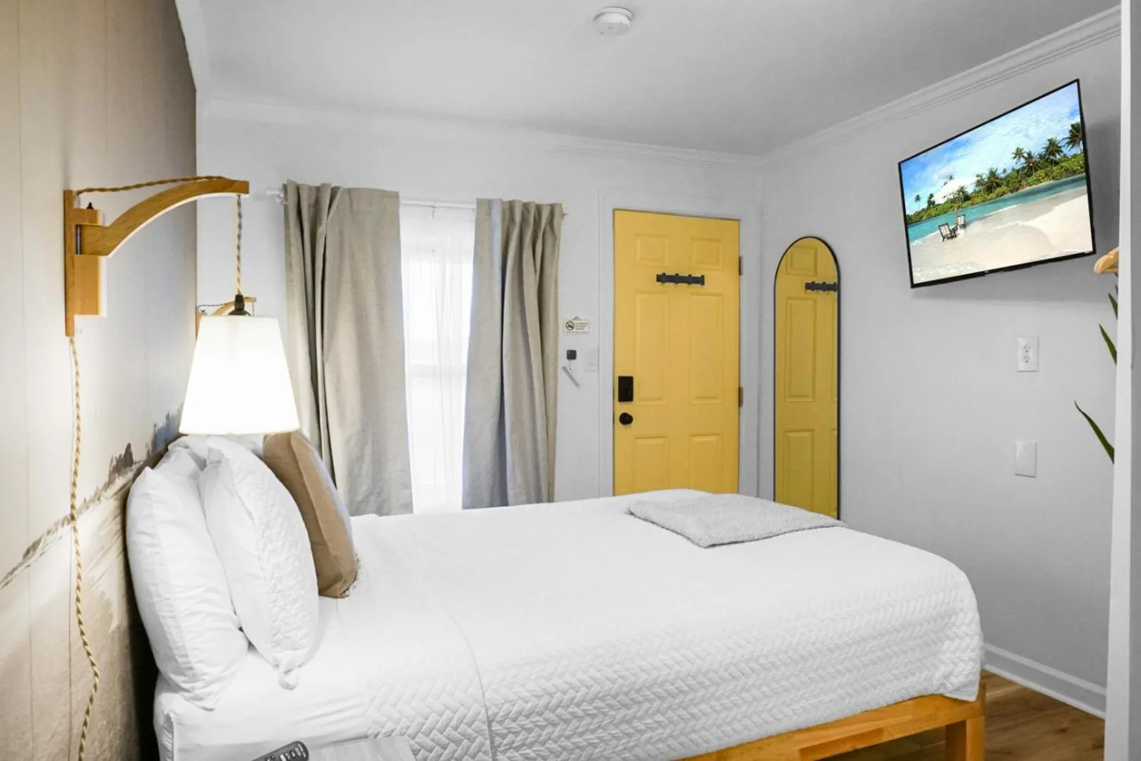 Bed in The Boardwalk Inn