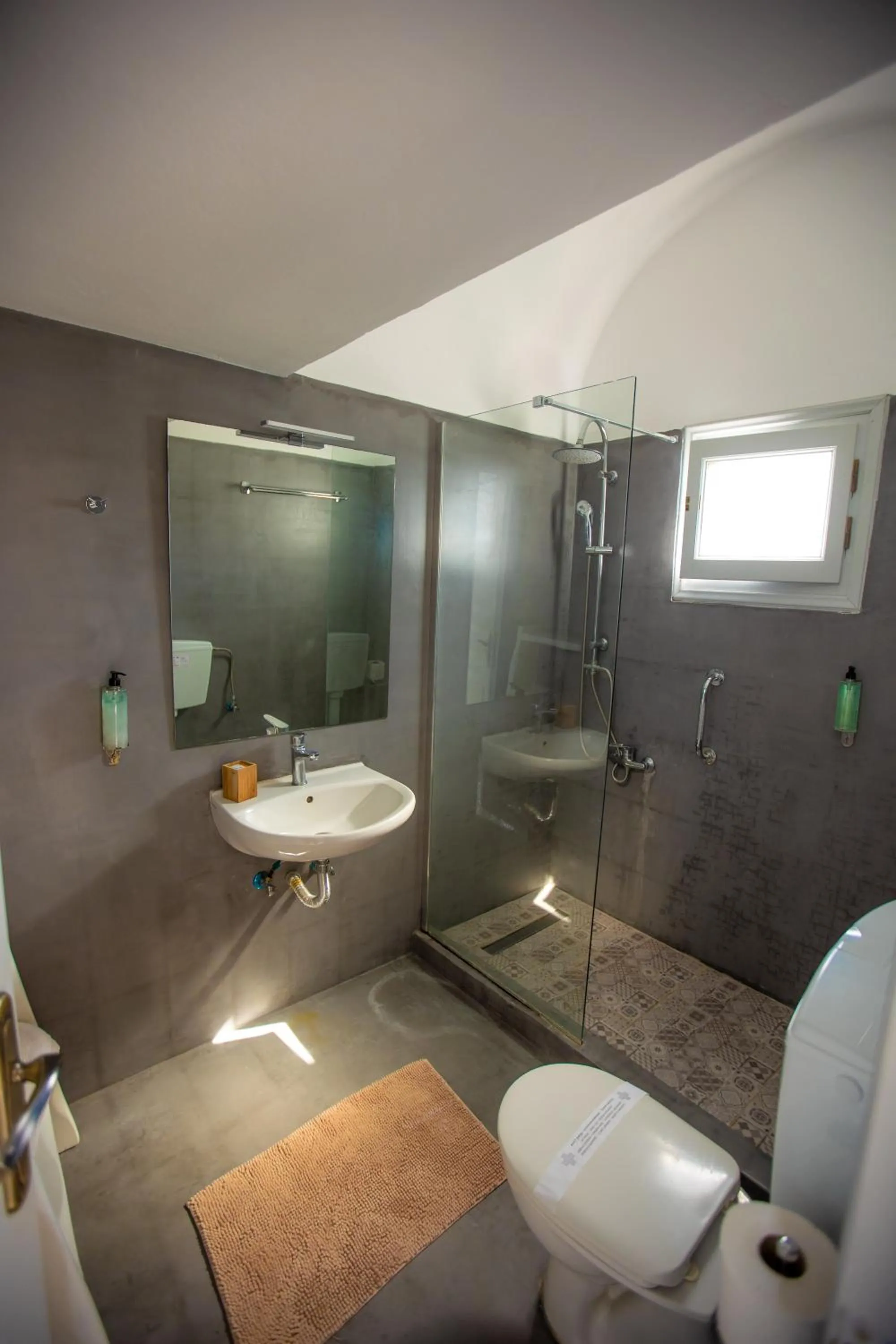 Shower in Phaos Santorini Suites